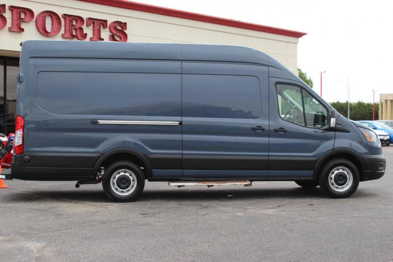 2021 Gray Ford Transit 250 Van High Roof w/Sliding Pass. 148-in. WB EL (1FTBR3X83MK) with an 3.5L Flex Fuel V6 275hp 262ft. lbs. 3.5L V6 engine, Automatic 10-Speed transmission, located at 4301 NW 39th , Oklahoma City, OK, 73112, (405) 949-5600, 35.512135, -97.598671 - NO DRIVERS LICENCE -NO FULL COVERAGE INSURANCE - NO CREDIT CHECK. COME ON OVER TO SUPERSPORTS, TAKE A LOOK AND TEST DRIVE. PLEASE GIVE US A CALL AT (405) 949-5600. NO LICENCIA DE CONDUCIR - NO SEGURO DE COBERTURA TOTAL - NO VERIFICACION DE CREDITO. VISITENOS EN SUPERSPORTS, MIRE NUEST - Photo#2