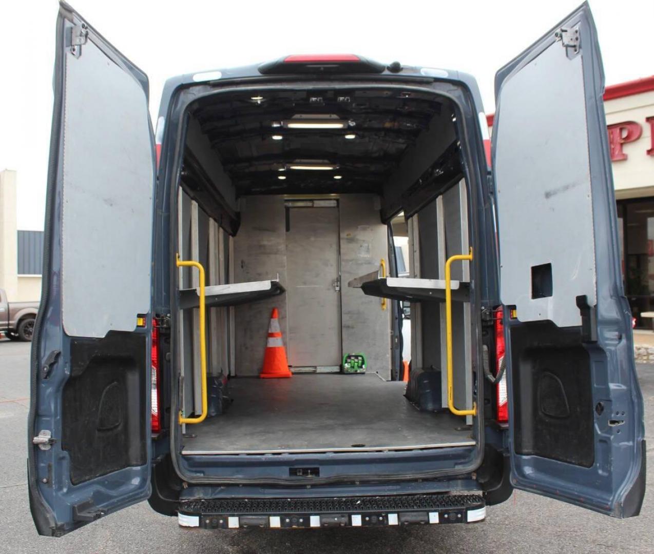 2021 Gray Ford Transit 250 Van High Roof w/Sliding Pass. 148-in. WB EL (1FTBR3X83MK) with an 3.5L Flex Fuel V6 275hp 262ft. lbs. 3.5L V6 engine, Automatic 10-Speed transmission, located at 4301 NW 39th , Oklahoma City, OK, 73112, (405) 949-5600, 35.512135, -97.598671 - NO DRIVERS LICENCE -NO FULL COVERAGE INSURANCE - NO CREDIT CHECK. COME ON OVER TO SUPERSPORTS, TAKE A LOOK AND TEST DRIVE. PLEASE GIVE US A CALL AT (405) 949-5600. NO LICENCIA DE CONDUCIR - NO SEGURO DE COBERTURA TOTAL - NO VERIFICACION DE CREDITO. VISITENOS EN SUPERSPORTS, MIRE NUEST - Photo#11