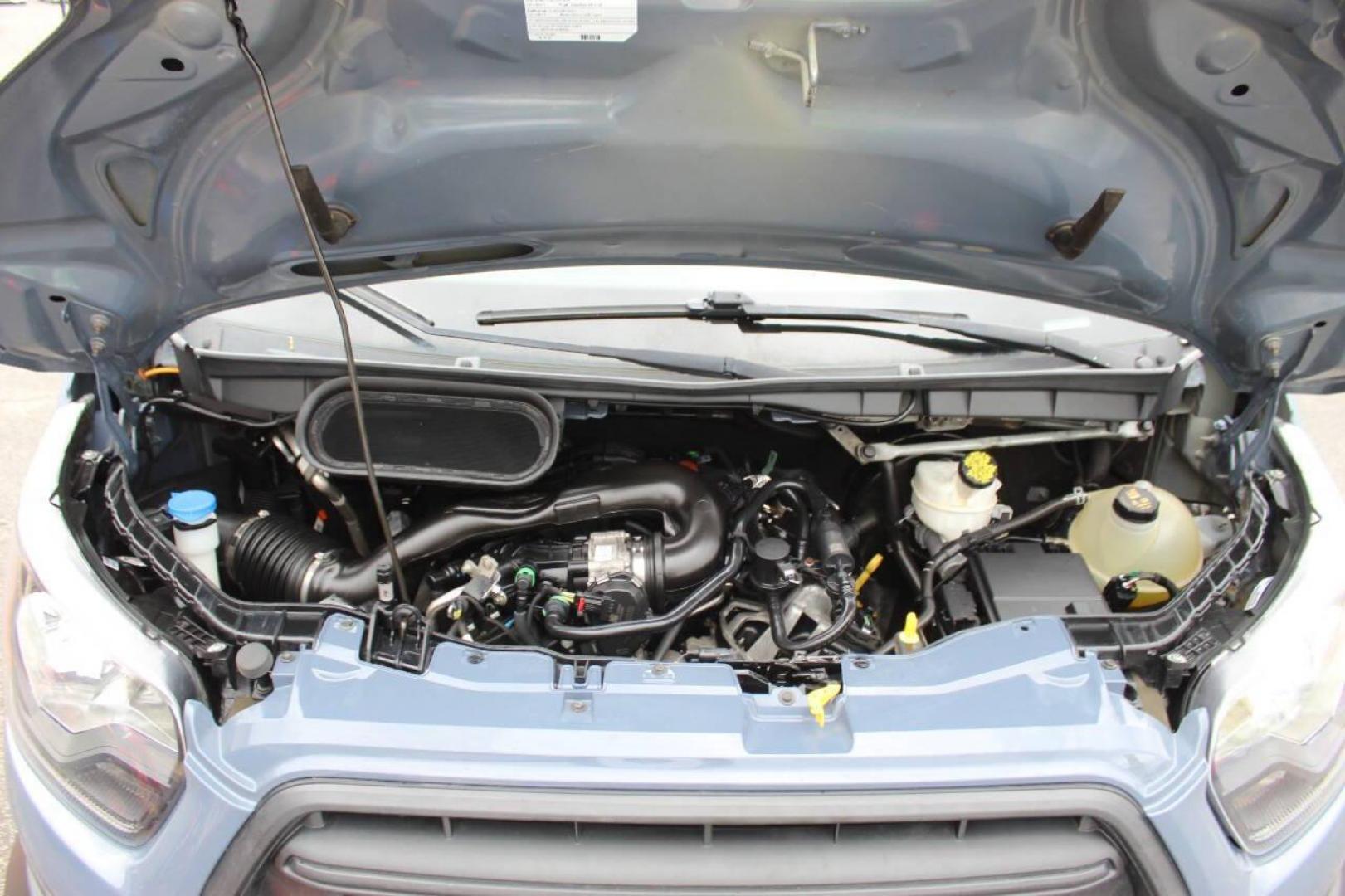 2021 Gray Ford Transit 250 Van High Roof w/Sliding Pass. 148-in. WB EL (1FTBR3X83MK) with an 3.5L Flex Fuel V6 275hp 262ft. lbs. 3.5L V6 engine, Automatic 10-Speed transmission, located at 4301 NW 39th , Oklahoma City, OK, 73112, (405) 949-5600, 35.512135, -97.598671 - NO DRIVERS LICENCE -NO FULL COVERAGE INSURANCE - NO CREDIT CHECK. COME ON OVER TO SUPERSPORTS, TAKE A LOOK AND TEST DRIVE. PLEASE GIVE US A CALL AT (405) 949-5600. NO LICENCIA DE CONDUCIR - NO SEGURO DE COBERTURA TOTAL - NO VERIFICACION DE CREDITO. VISITENOS EN SUPERSPORTS, MIRE NUEST - Photo#8
