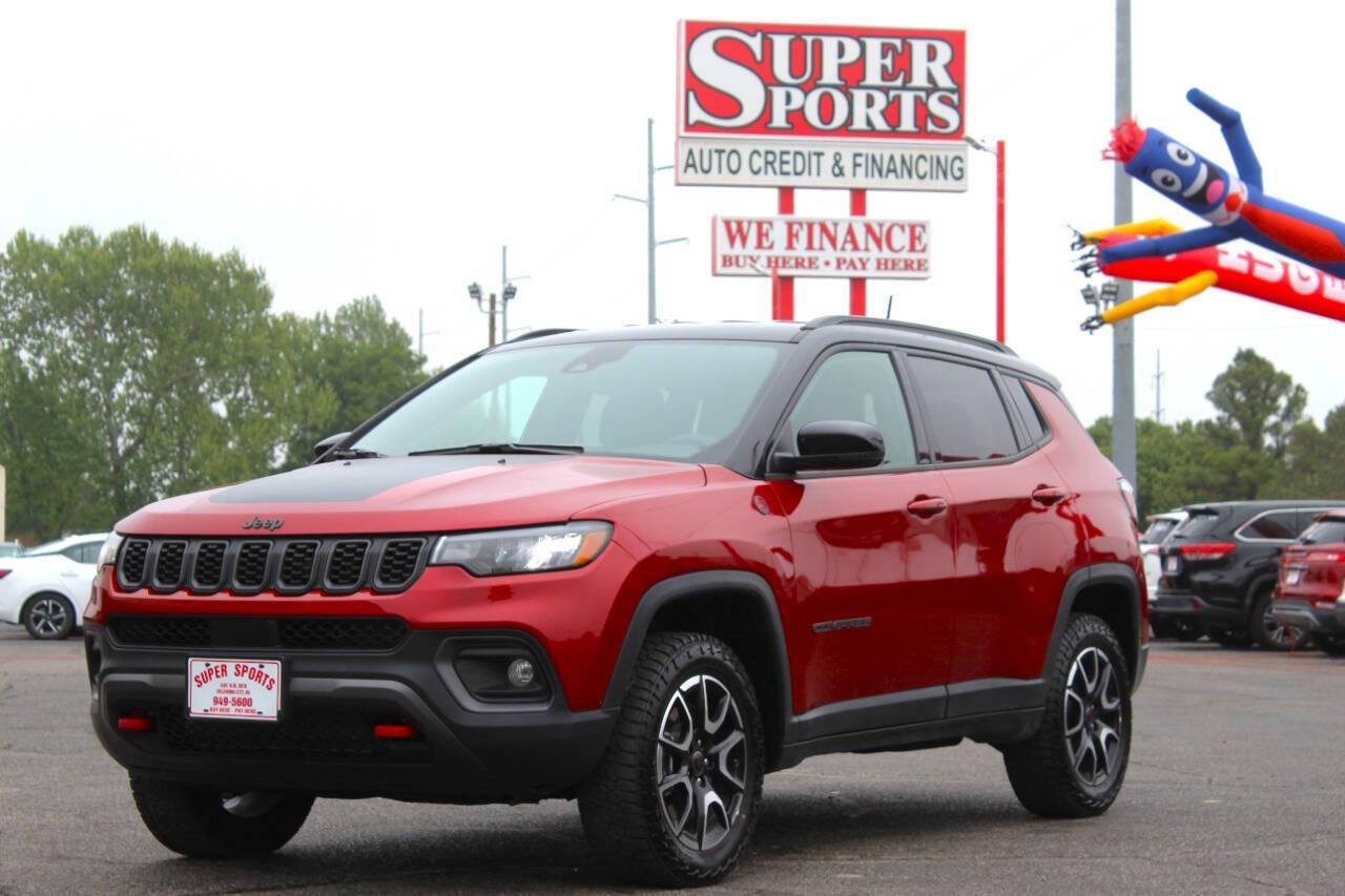 2025 Red Jeep Compass Trailhawk (3C4NJDDN4ST) with an 2.0L Turbo I4 200hp 221ft. lbs. 2.0L I4 engine, Automatic 8-Speed transmission, located at 4301 NW 39th , Oklahoma City, OK, 73112, (405) 949-5600, 35.512135, -97.598671 - NO DRIVERS LICENCE -NO FULL COVERAGE INSURANCE - NO CREDIT CHECK. COME ON OVER TO SUPERSPORTS, TAKE A LOOK AND TEST DRIVE. PLEASE GIVE US A CALL AT (405) 949-5600. NO LICENCIA DE CONDUCIR - NO SEGURO DE COBERTURA TOTAL - NO VERIFICACION DE CREDITO. VISITENOS EN SUPERSPORTS, MIRE NUESTRO - Photo#6