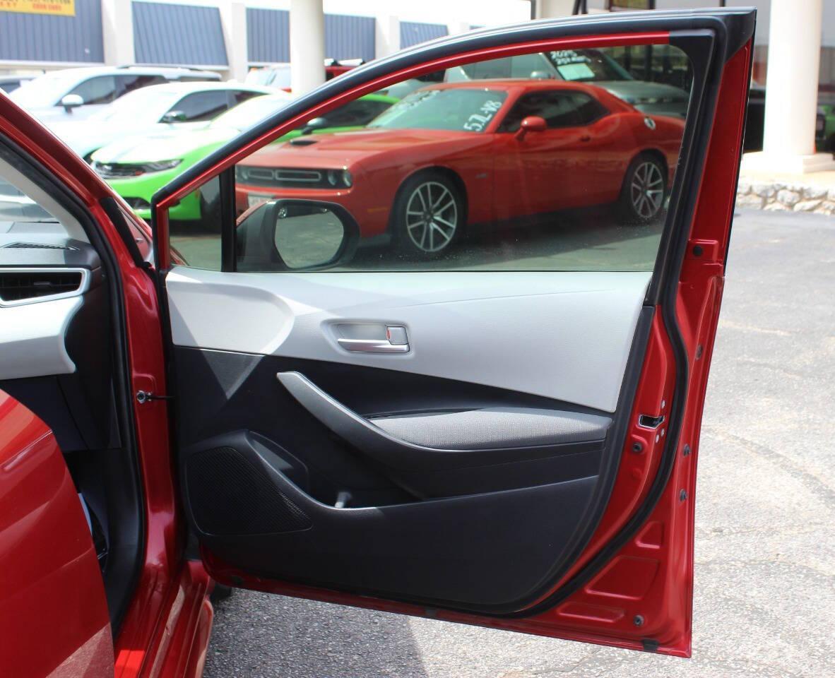 2021 Red Toyota Corolla LE (JTDEPMAE2MJ) with an 1.8L I4 139hp 126ft. lbs. 1.8L I4 engine, CVT transmission, located at 4301 NW 39th , Oklahoma City, OK, 73112, (405) 949-5600, 35.512135, -97.598671 - NO DRIVERS LICENCE -NO FULL COVERAGE INSURANCE - NO CREDIT CHECK. COME ON OVER TO SUPERSPORTS, TAKE A LOOK AND TEST DRIVE. PLEASE GIVE US A CALL AT (405) 949-5600. NO LICENCIA DE CONDUCIR - NO SEGURO DE COBERTURA TOTAL - NO VERIFICACION DE CREDITO. VISITENOS EN SUPERSPORTS, MIRE NUEST - Photo#7