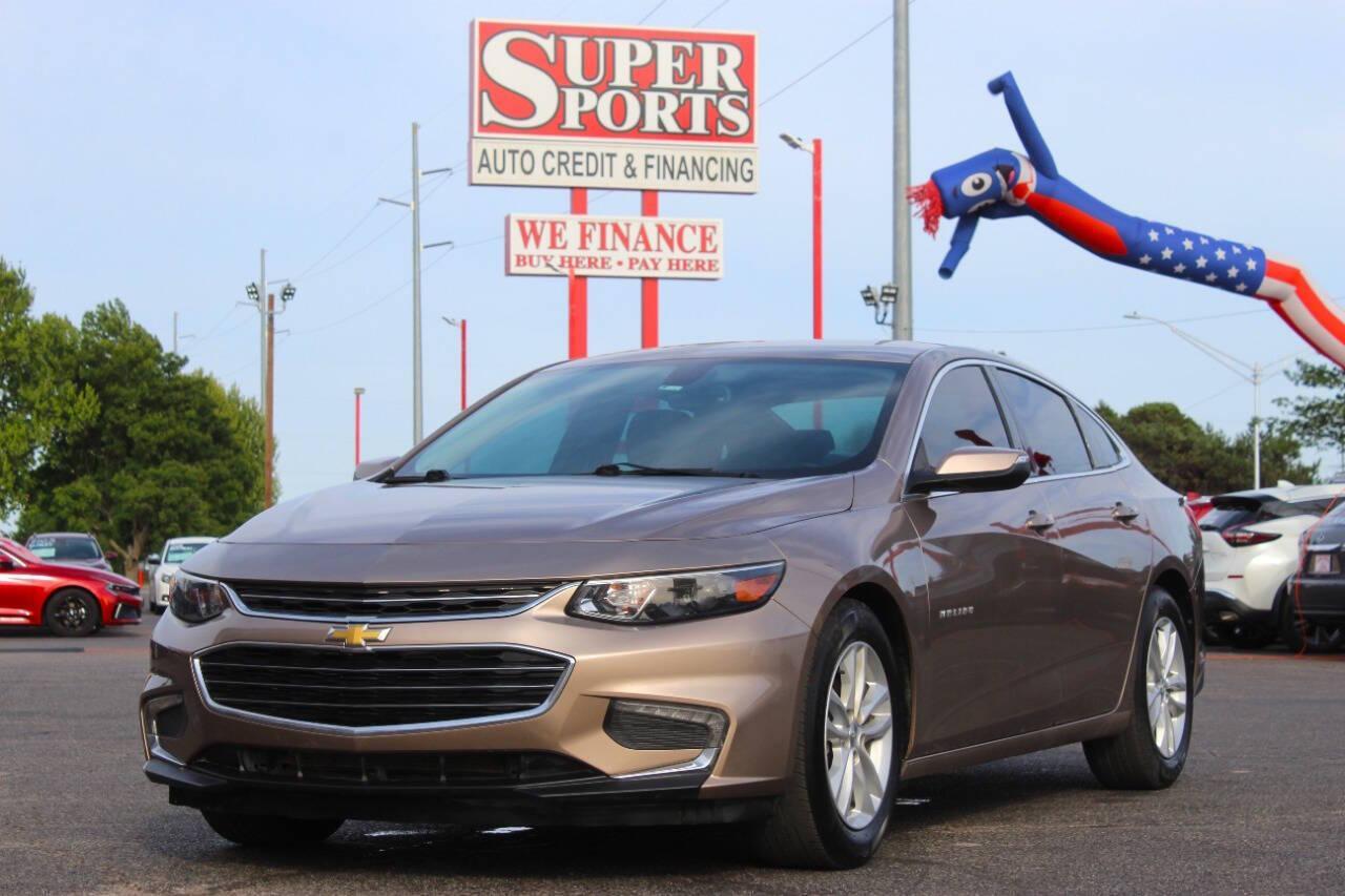 2018 Tan Chevrolet Malibu LT (1G1ZD5ST4JF) with an Ecotec 1.5L Turbo I4 160hp 184ft. lbs. 1.5L I4 engine, Automatic 6-Speed transmission, located at 4301 NW 39th , Oklahoma City, OK, 73112, (405) 949-5600, 35.512135, -97.598671 - NO DRIVERS LICENCE -NO FULL COVERAGE INSURANCE - NO CREDIT CHECK. COME ON OVER TO SUPERSPORTS, TAKE A LOOK AND TEST DRIVE. PLEASE GIVE US A CALL AT (405) 949-5600. NO LICENCIA DE CONDUCIR - NO SEGURO DE COBERTURA TOTAL - NO VERIFICACION DE CREDITO. VISITENOS EN SUPERSPORTS, MIRE NUESTRO - Photo#6