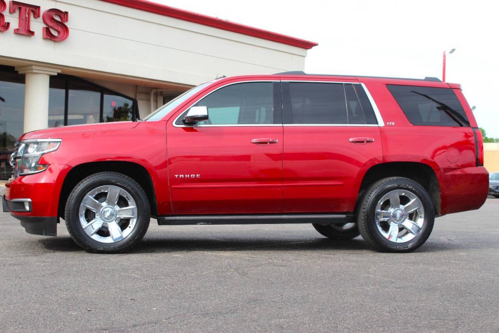 2015 Red Chevrolet Tahoe LTZ 4WD (1GNSKCKC8FR) with an EcoTec3 5.3L Flex Fuel V8 355hp 383ft. lbs. 5.3L V8 engine, Automatic 6-Speed transmission, located at 4301 NW 39th , Oklahoma City, OK, 73112, (405) 949-5600, 35.512135, -97.598671- Photo#5