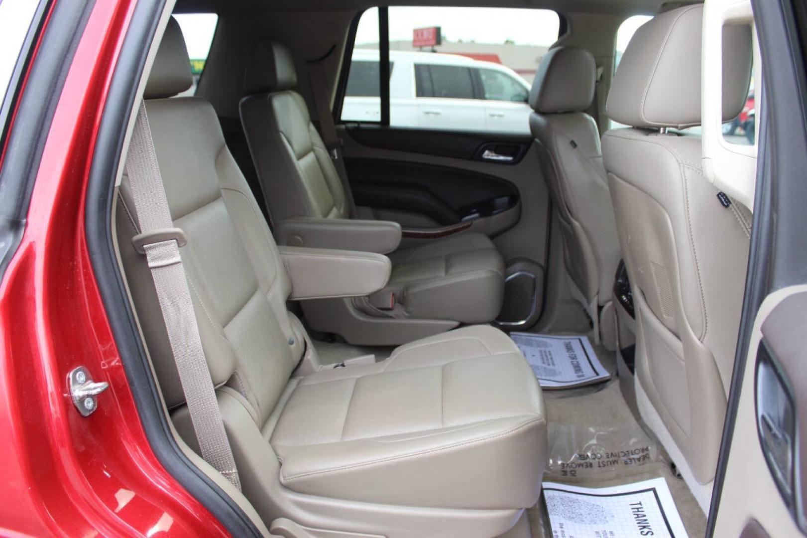 2015 Red Chevrolet Tahoe LTZ 4WD (1GNSKCKC8FR) with an EcoTec3 5.3L Flex Fuel V8 355hp 383ft. lbs. 5.3L V8 engine, Automatic 6-Speed transmission, located at 4301 NW 39th , Oklahoma City, OK, 73112, (405) 949-5600, 35.512135, -97.598671- Photo#10