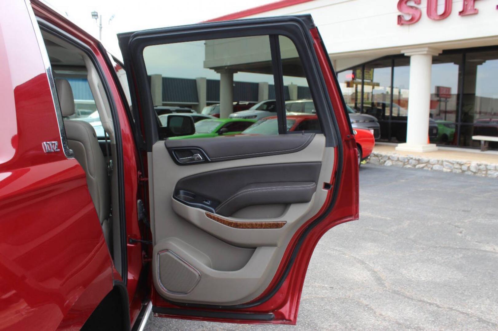 2015 Red Chevrolet Tahoe LTZ 4WD (1GNSKCKC8FR) with an EcoTec3 5.3L Flex Fuel V8 355hp 383ft. lbs. 5.3L V8 engine, Automatic 6-Speed transmission, located at 4301 NW 39th , Oklahoma City, OK, 73112, (405) 949-5600, 35.512135, -97.598671- Photo#11