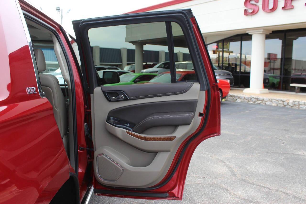 2015 Red Chevrolet Tahoe LTZ 4WD (1GNSKCKC8FR) with an EcoTec3 5.3L Flex Fuel V8 355hp 383ft. lbs. 5.3L V8 engine, Automatic 6-Speed transmission, located at 4301 NW 39th , Oklahoma City, OK, 73112, (405) 949-5600, 35.512135, -97.598671 - NO DRIVERS LICENCE -NO FULL COVERAGE INSURANCE - NO CREDIT CHECK. COME ON OVER TO SUPERSPORTS, TAKE A LOOK AND TEST DRIVE. PLEASE GIVE US A CALL AT (405) 949-5600. NO LICENCIA DE CONDUCIR - NO SEGURO DE COBERTURA TOTAL - NO VERIFICACION DE CREDITO. VISITENOS EN SUPERSPORTS, MIRE NUEST - Photo#11