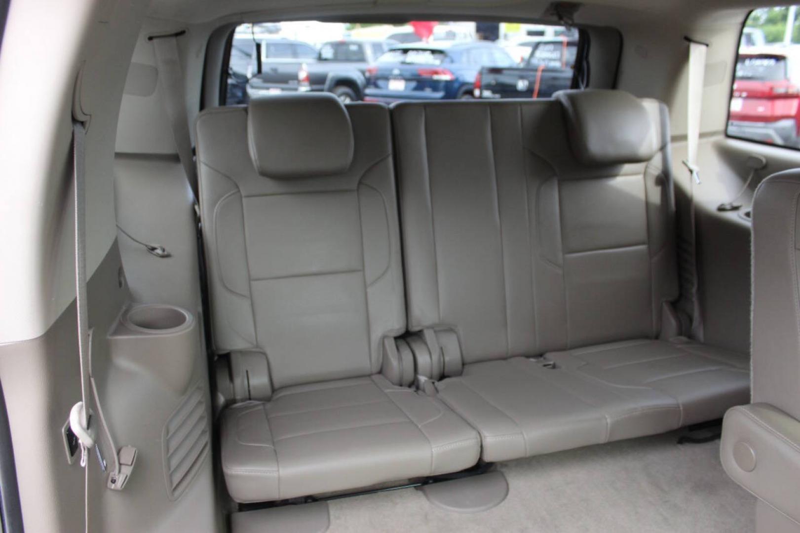 2015 Red Chevrolet Tahoe LTZ 4WD (1GNSKCKC8FR) with an EcoTec3 5.3L Flex Fuel V8 355hp 383ft. lbs. 5.3L V8 engine, Automatic 6-Speed transmission, located at 4301 NW 39th , Oklahoma City, OK, 73112, (405) 949-5600, 35.512135, -97.598671- Photo#12