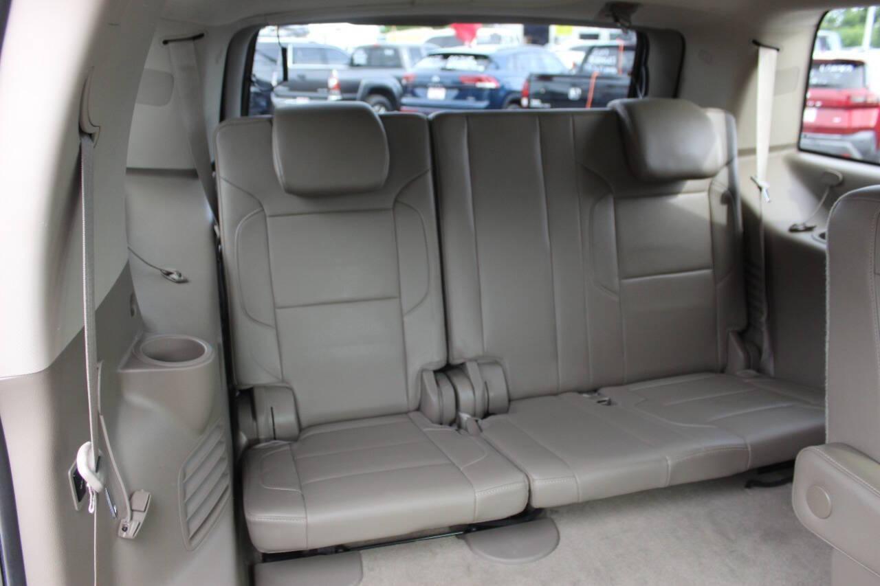 2015 Red Chevrolet Tahoe LTZ 4WD (1GNSKCKC8FR) with an EcoTec3 5.3L Flex Fuel V8 355hp 383ft. lbs. 5.3L V8 engine, Automatic 6-Speed transmission, located at 4301 NW 39th , Oklahoma City, OK, 73112, (405) 949-5600, 35.512135, -97.598671 - NO DRIVERS LICENCE -NO FULL COVERAGE INSURANCE - NO CREDIT CHECK. COME ON OVER TO SUPERSPORTS, TAKE A LOOK AND TEST DRIVE. PLEASE GIVE US A CALL AT (405) 949-5600. NO LICENCIA DE CONDUCIR - NO SEGURO DE COBERTURA TOTAL - NO VERIFICACION DE CREDITO. VISITENOS EN SUPERSPORTS, MIRE NUEST - Photo#12