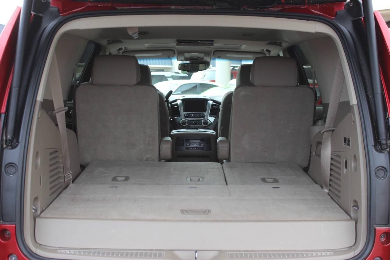 2015 Red Chevrolet Tahoe LTZ 4WD (1GNSKCKC8FR) with an EcoTec3 5.3L Flex Fuel V8 355hp 383ft. lbs. 5.3L V8 engine, Automatic 6-Speed transmission, located at 4301 NW 39th , Oklahoma City, OK, 73112, (405) 949-5600, 35.512135, -97.598671 - NO DRIVERS LICENCE -NO FULL COVERAGE INSURANCE - NO CREDIT CHECK. COME ON OVER TO SUPERSPORTS, TAKE A LOOK AND TEST DRIVE. PLEASE GIVE US A CALL AT (405) 949-5600. NO LICENCIA DE CONDUCIR - NO SEGURO DE COBERTURA TOTAL - NO VERIFICACION DE CREDITO. VISITENOS EN SUPERSPORTS, MIRE NUEST - Photo#15