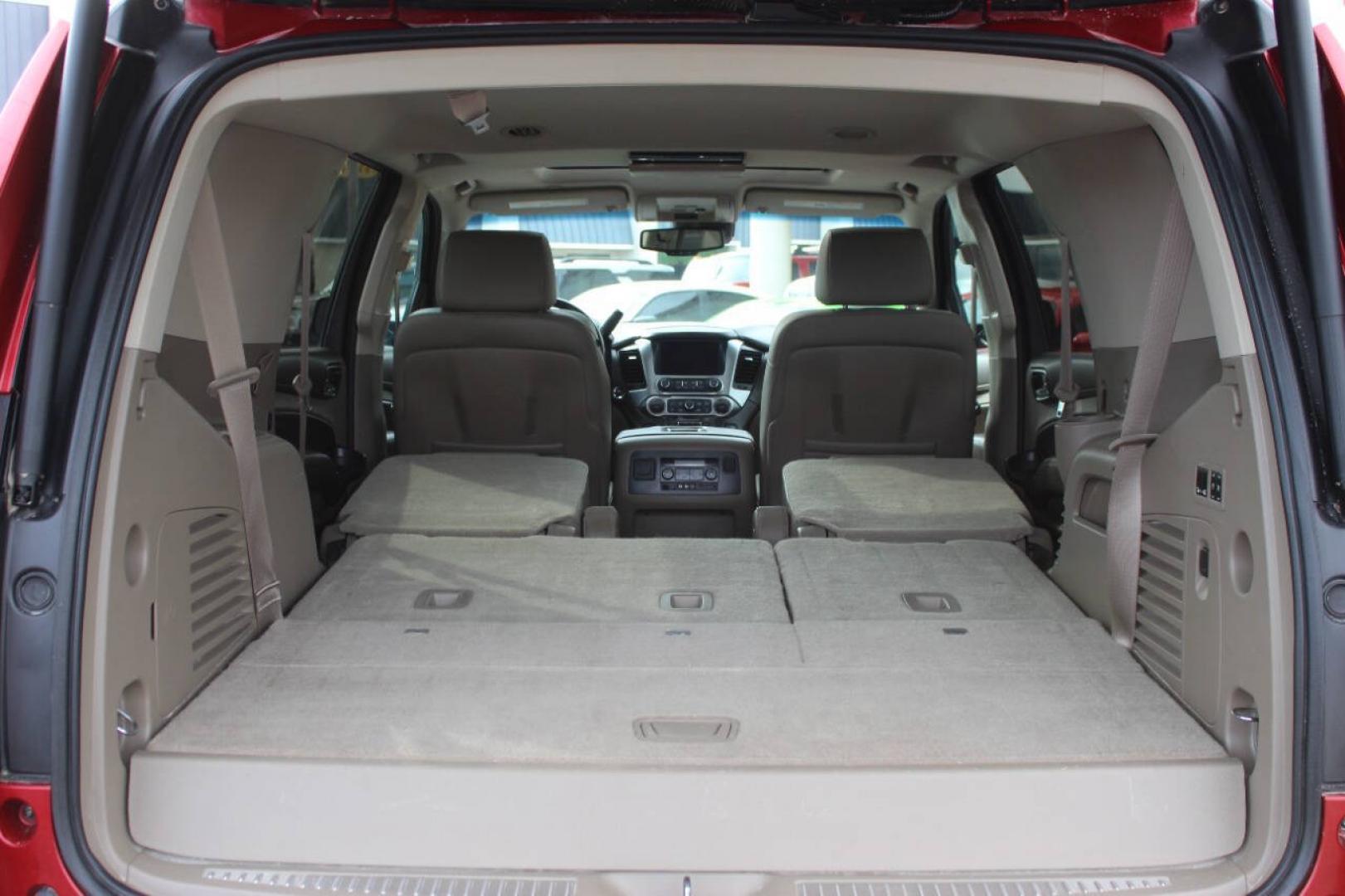 2015 Red Chevrolet Tahoe LTZ 4WD (1GNSKCKC8FR) with an EcoTec3 5.3L Flex Fuel V8 355hp 383ft. lbs. 5.3L V8 engine, Automatic 6-Speed transmission, located at 4301 NW 39th , Oklahoma City, OK, 73112, (405) 949-5600, 35.512135, -97.598671- Photo#16