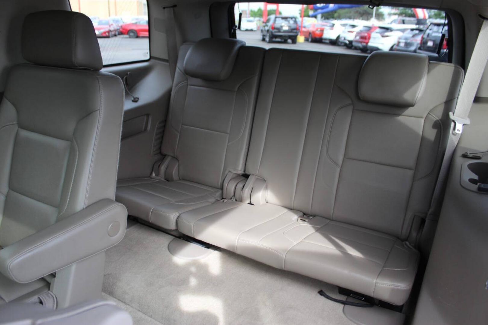 2015 Red Chevrolet Tahoe LTZ 4WD (1GNSKCKC8FR) with an EcoTec3 5.3L Flex Fuel V8 355hp 383ft. lbs. 5.3L V8 engine, Automatic 6-Speed transmission, located at 4301 NW 39th , Oklahoma City, OK, 73112, (405) 949-5600, 35.512135, -97.598671- Photo#17