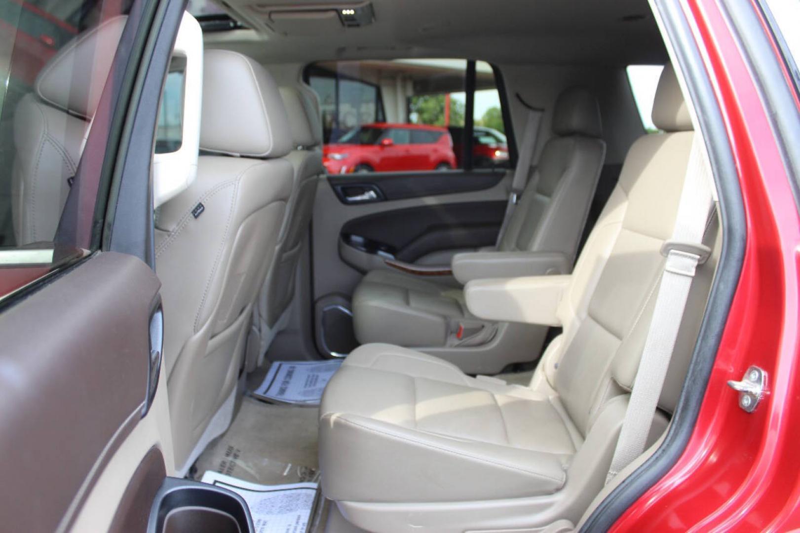 2015 Red Chevrolet Tahoe LTZ 4WD (1GNSKCKC8FR) with an EcoTec3 5.3L Flex Fuel V8 355hp 383ft. lbs. 5.3L V8 engine, Automatic 6-Speed transmission, located at 4301 NW 39th , Oklahoma City, OK, 73112, (405) 949-5600, 35.512135, -97.598671- Photo#18