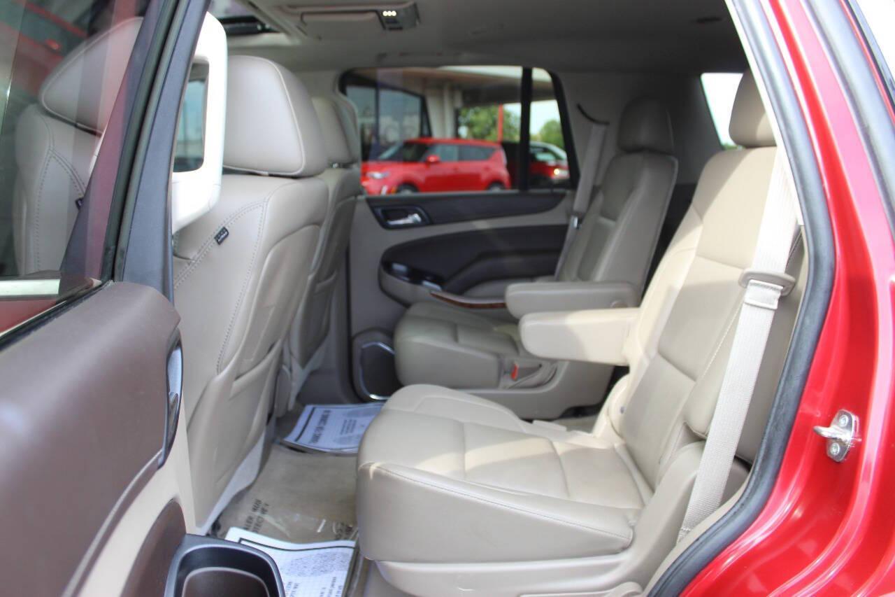 2015 Red Chevrolet Tahoe LTZ 4WD (1GNSKCKC8FR) with an EcoTec3 5.3L Flex Fuel V8 355hp 383ft. lbs. 5.3L V8 engine, Automatic 6-Speed transmission, located at 4301 NW 39th , Oklahoma City, OK, 73112, (405) 949-5600, 35.512135, -97.598671 - NO DRIVERS LICENCE -NO FULL COVERAGE INSURANCE - NO CREDIT CHECK. COME ON OVER TO SUPERSPORTS, TAKE A LOOK AND TEST DRIVE. PLEASE GIVE US A CALL AT (405) 949-5600. NO LICENCIA DE CONDUCIR - NO SEGURO DE COBERTURA TOTAL - NO VERIFICACION DE CREDITO. VISITENOS EN SUPERSPORTS, MIRE NUEST - Photo#18