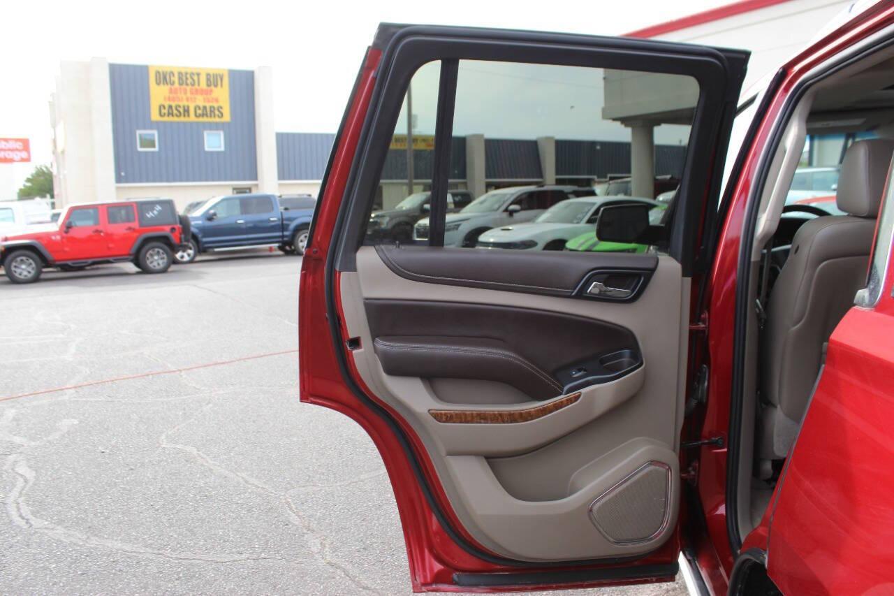 2015 Red Chevrolet Tahoe LTZ 4WD (1GNSKCKC8FR) with an EcoTec3 5.3L Flex Fuel V8 355hp 383ft. lbs. 5.3L V8 engine, Automatic 6-Speed transmission, located at 4301 NW 39th , Oklahoma City, OK, 73112, (405) 949-5600, 35.512135, -97.598671 - NO DRIVERS LICENCE -NO FULL COVERAGE INSURANCE - NO CREDIT CHECK. COME ON OVER TO SUPERSPORTS, TAKE A LOOK AND TEST DRIVE. PLEASE GIVE US A CALL AT (405) 949-5600. NO LICENCIA DE CONDUCIR - NO SEGURO DE COBERTURA TOTAL - NO VERIFICACION DE CREDITO. VISITENOS EN SUPERSPORTS, MIRE NUEST - Photo#19