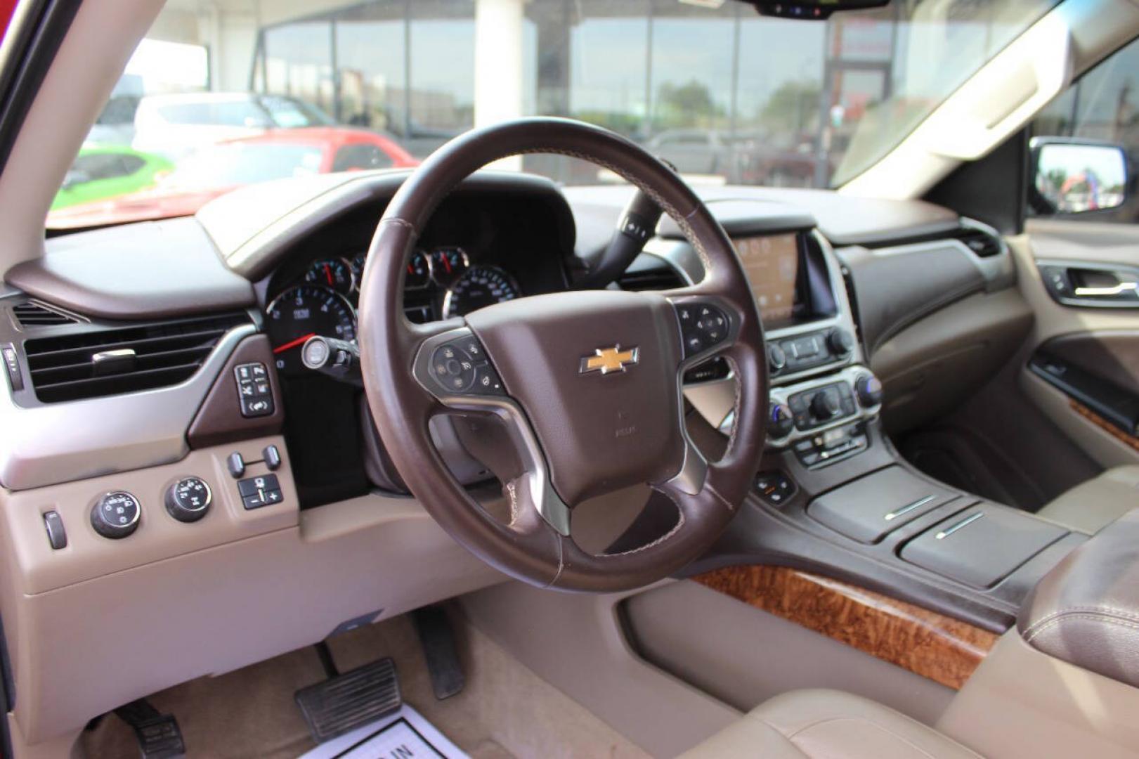 2015 Red Chevrolet Tahoe LTZ 4WD (1GNSKCKC8FR) with an EcoTec3 5.3L Flex Fuel V8 355hp 383ft. lbs. 5.3L V8 engine, Automatic 6-Speed transmission, located at 4301 NW 39th , Oklahoma City, OK, 73112, (405) 949-5600, 35.512135, -97.598671- Photo#20