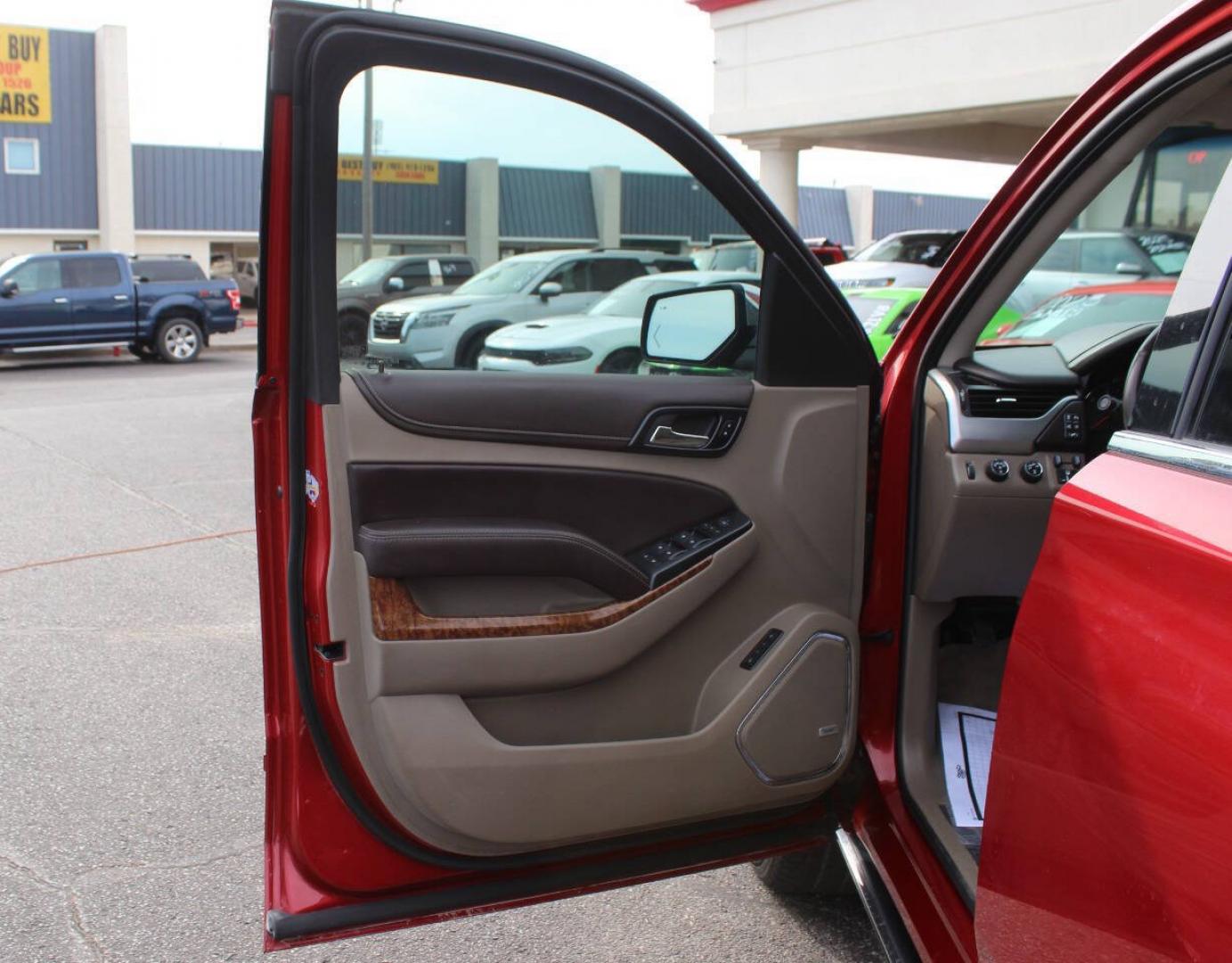 2015 Red Chevrolet Tahoe LTZ 4WD (1GNSKCKC8FR) with an EcoTec3 5.3L Flex Fuel V8 355hp 383ft. lbs. 5.3L V8 engine, Automatic 6-Speed transmission, located at 4301 NW 39th , Oklahoma City, OK, 73112, (405) 949-5600, 35.512135, -97.598671- Photo#22