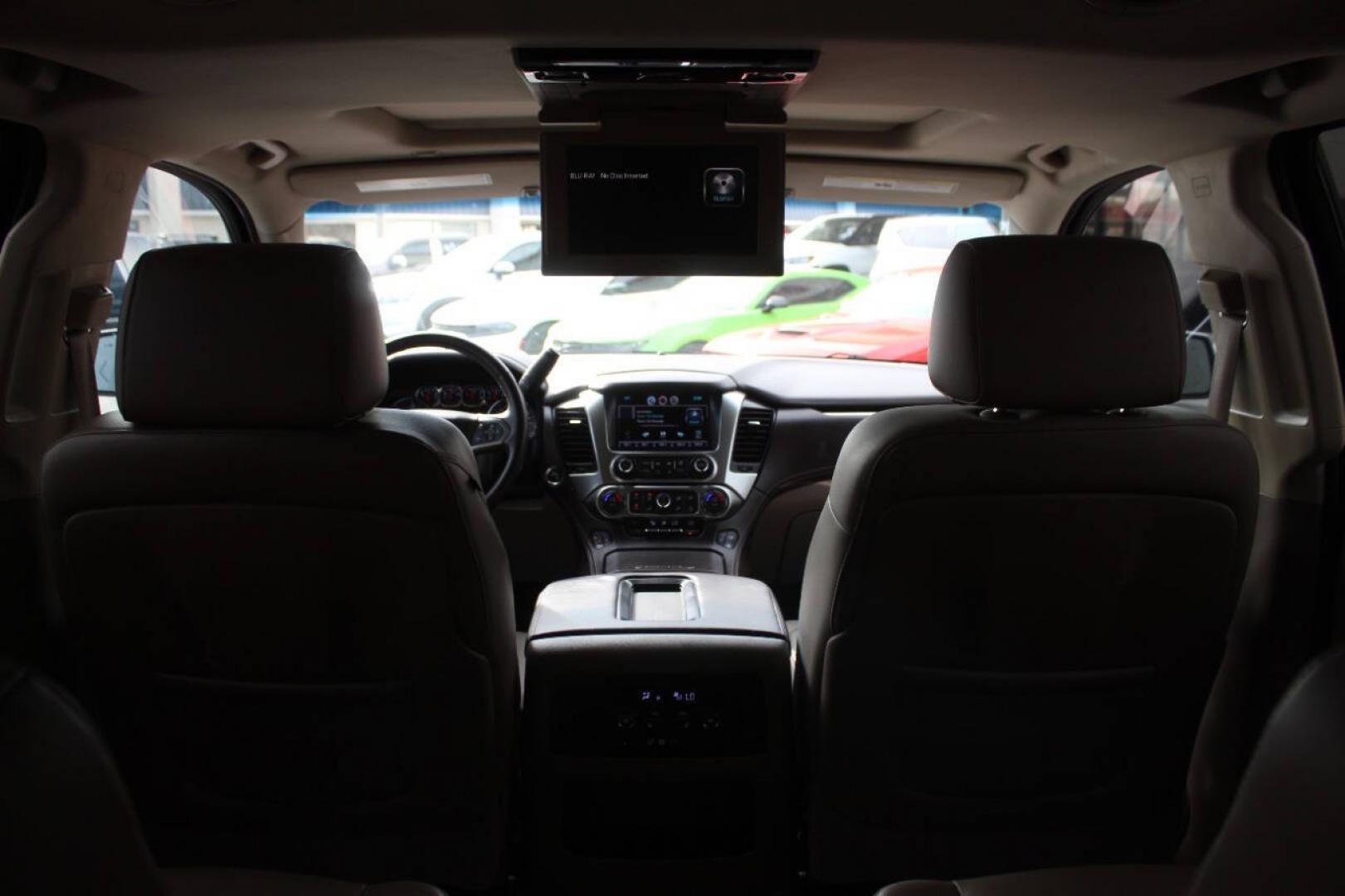 2015 Red Chevrolet Tahoe LTZ 4WD (1GNSKCKC8FR) with an EcoTec3 5.3L Flex Fuel V8 355hp 383ft. lbs. 5.3L V8 engine, Automatic 6-Speed transmission, located at 4301 NW 39th , Oklahoma City, OK, 73112, (405) 949-5600, 35.512135, -97.598671- Photo#27