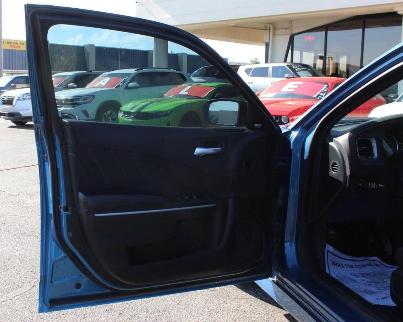 2023 Blue Dodge Charger GT (2C3CDXHG7PH) with an Pentastar 3.6L V6 300hp 264ft. lbs. 3.6L V6 engine, Automatic 8-Speed transmission, located at 4301 NW 39th , Oklahoma City, OK, 73112, (405) 949-5600, 35.512135, -97.598671 - Hablamos espaol. SPEND SMART --- BUY FROM SUPER SPORTS. ASKING WHOLESALE CASH PRICE: $27,900 (CASH ONLY) PLUS $100 PROCESSING FEE. ALL PRICES, DOWN PAYMENTS, PAYMENTS, AND FINANCE TERMS ARE NEGOTIABLE AT THE TIME OF APPROVAL. WE WILL WORK WITH YOU TO FIT YOUR BUDGET. WE WILL EVEN LOW- Photo#18