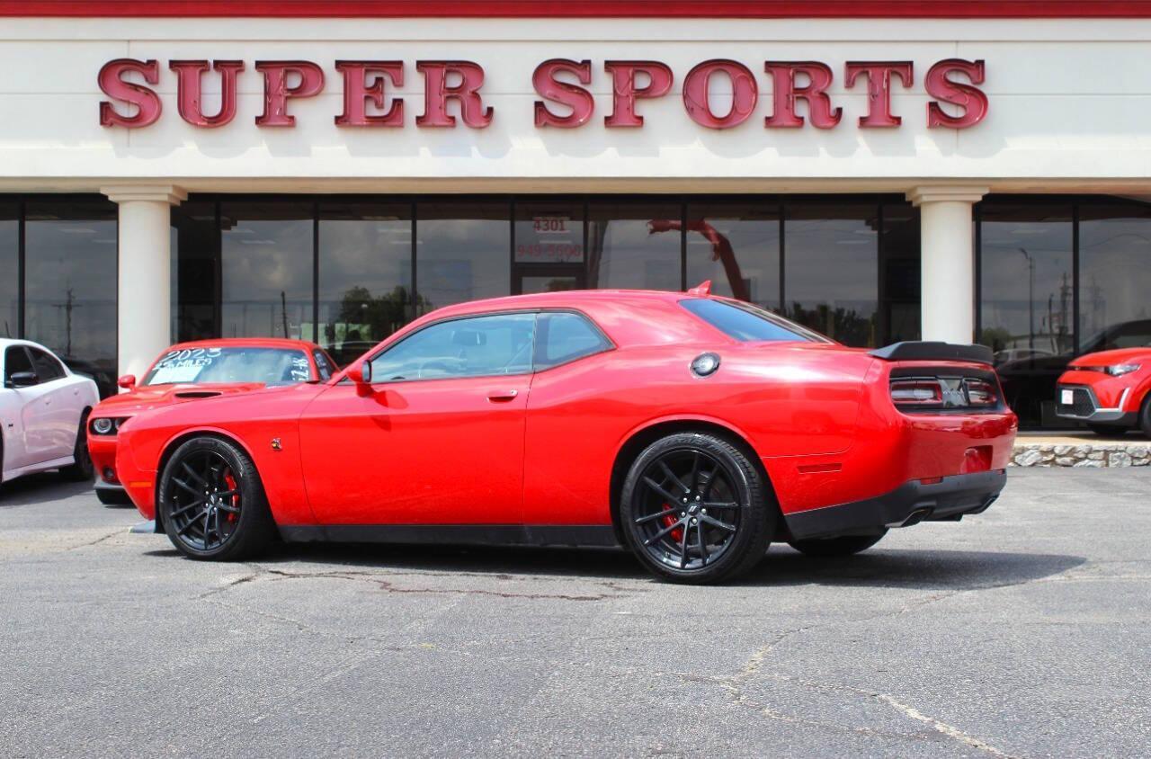 2019 Red Dodge Challenger R/T SCAT Pack (2C3CDZFJ6KH) with an 6.4L V8 6.4L V8 engine, Automatic 8-Speed transmission, located at 4301 NW 39th , Oklahoma City, OK, 73112, (405) 949-5600, 35.512135, -97.598671 - NO DRIVERS LICENCE -NO FULL COVERAGE INSURANCE - NO CREDIT CHECK. COME ON OVER TO SUPERSPORTS, TAKE A LOOK AND TEST DRIVE. PLEASE GIVE US A CALL AT (405) 949-5600. NO LICENCIA DE CONDUCIR - NO SEGURO DE COBERTURA TOTAL - NO VERIFICACION DE CREDITO. VISITENOS EN SUPERSPORTS, MIRE NUE - Photo#4