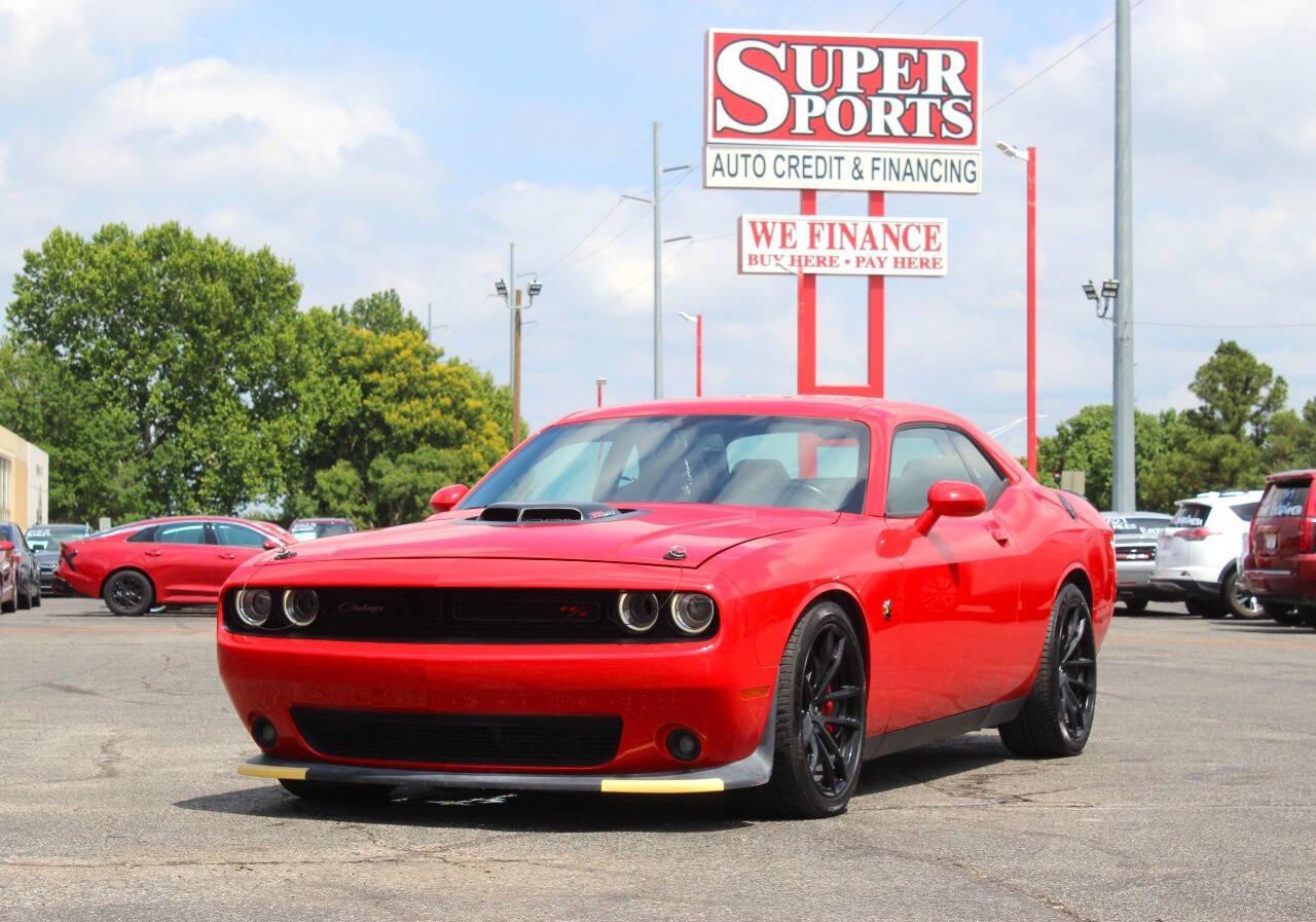 2019 Red Dodge Challenger R/T SCAT Pack (2C3CDZFJ6KH) with an 6.4L V8 6.4L V8 engine, Automatic 8-Speed transmission, located at 4301 NW 39th , Oklahoma City, OK, 73112, (405) 949-5600, 35.512135, -97.598671 - NO DRIVERS LICENCE -NO FULL COVERAGE INSURANCE - NO CREDIT CHECK. COME ON OVER TO SUPERSPORTS, TAKE A LOOK AND TEST DRIVE. PLEASE GIVE US A CALL AT (405) 949-5600. NO LICENCIA DE CONDUCIR - NO SEGURO DE COBERTURA TOTAL - NO VERIFICACION DE CREDITO. VISITENOS EN SUPERSPORTS, MIRE NUE - Photo#6
