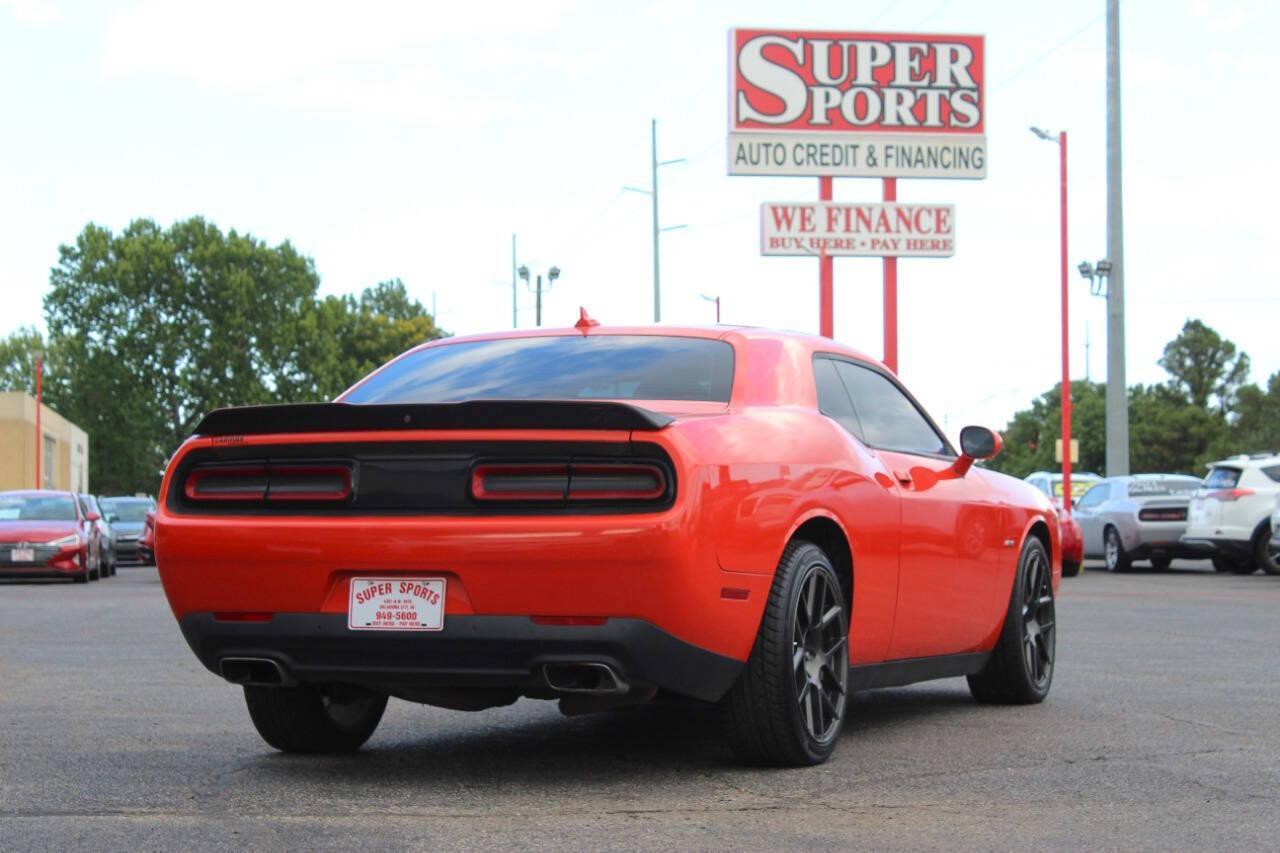 2018 Orange Dodge Challenger R/T Plus (2C3CDZBT2JH) with an 5.7L V8 5.7L V8 engine, Automatic 8-Speed transmission, located at 4301 NW 39th , Oklahoma City, OK, 73112, (405) 949-5600, 35.512135, -97.598671 - NO DRIVERS LICENCE -NO FULL COVERAGE INSURANCE - NO CREDIT CHECK. COME ON OVER TO SUPERSPORTS, TAKE A LOOK AND TEST DRIVE. PLEASE GIVE US A CALL AT (405) 949-5600. NO LICENCIA DE CONDUCIR - NO SEGURO DE COBERTURA TOTAL - NO VERIFICACION DE CREDITO. VISITENOS EN SUPERSPORTS, MIRE NUESTRO - Photo#3