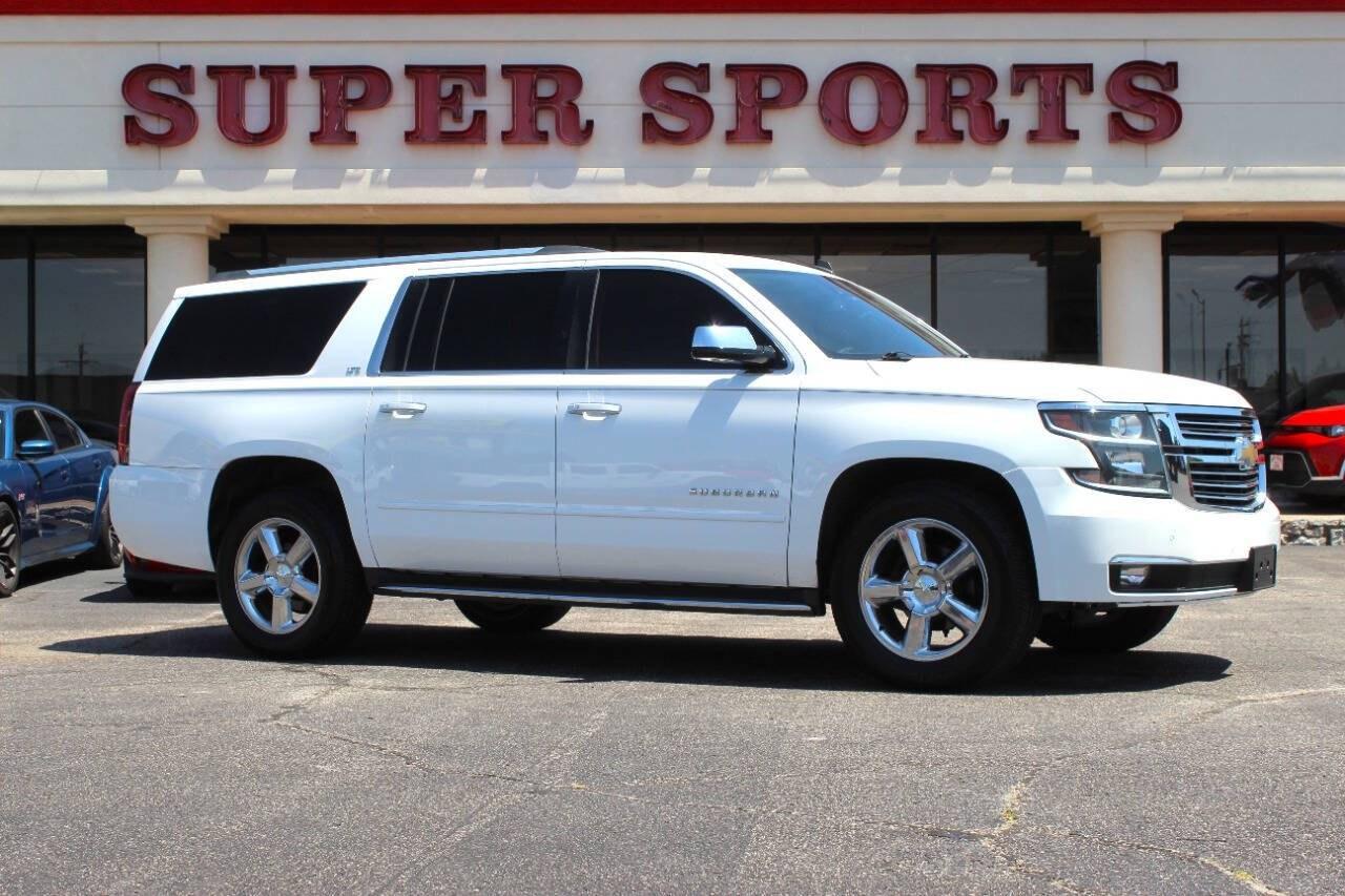 2015 White Chevrolet Suburban LTZ 1500 4WD (1GNSKKKC5FR) with an EcoTec3 5.3L Flex Fuel V8 355hp 383ft. lbs. 5.3L V8 engine, Automatic 6-Speed transmission, located at 4301 NW 39th , Oklahoma City, OK, 73112, (405) 949-5600, 35.512135, -97.598671- Photo#0