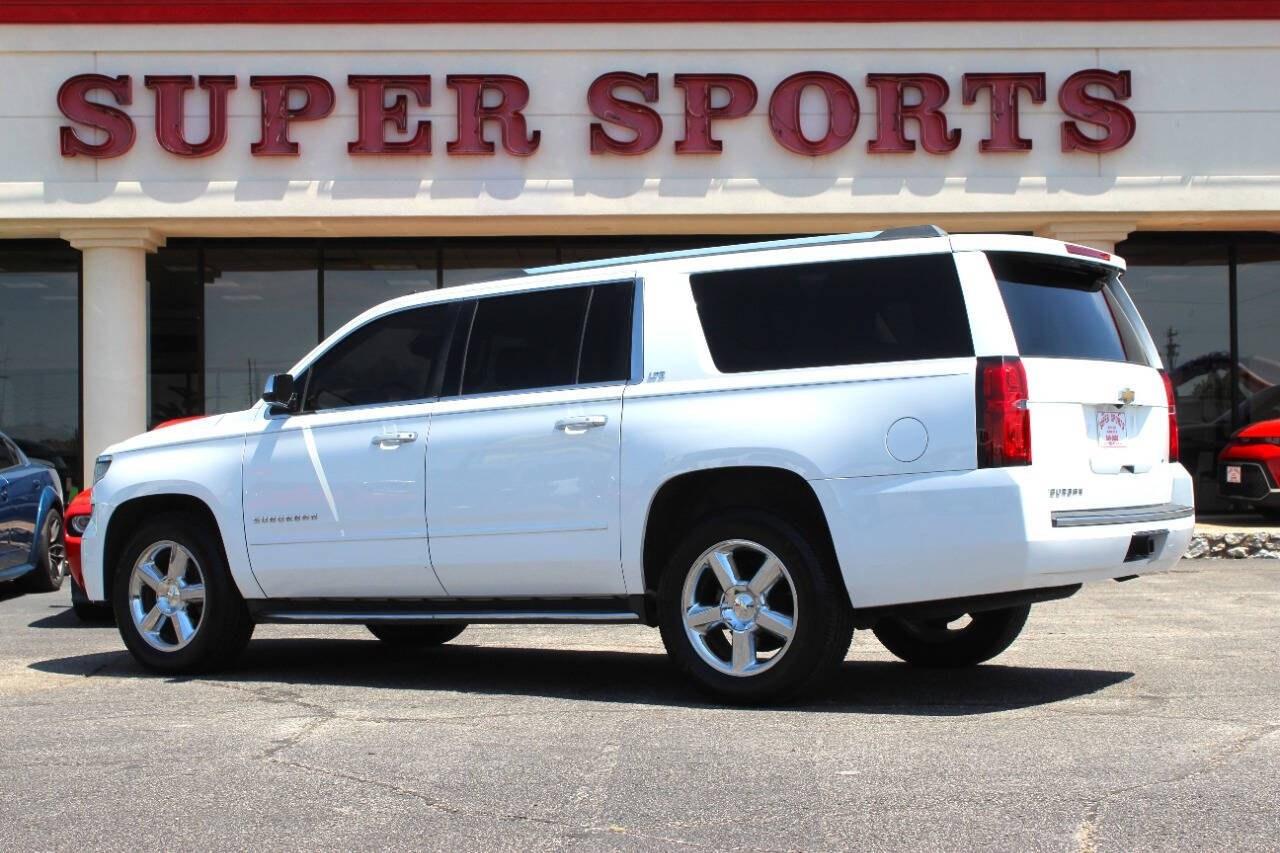 2015 White Chevrolet Suburban LTZ 1500 4WD (1GNSKKKC5FR) with an EcoTec3 5.3L Flex Fuel V8 355hp 383ft. lbs. 5.3L V8 engine, Automatic 6-Speed transmission, located at 4301 NW 39th , Oklahoma City, OK, 73112, (405) 949-5600, 35.512135, -97.598671- Photo#4