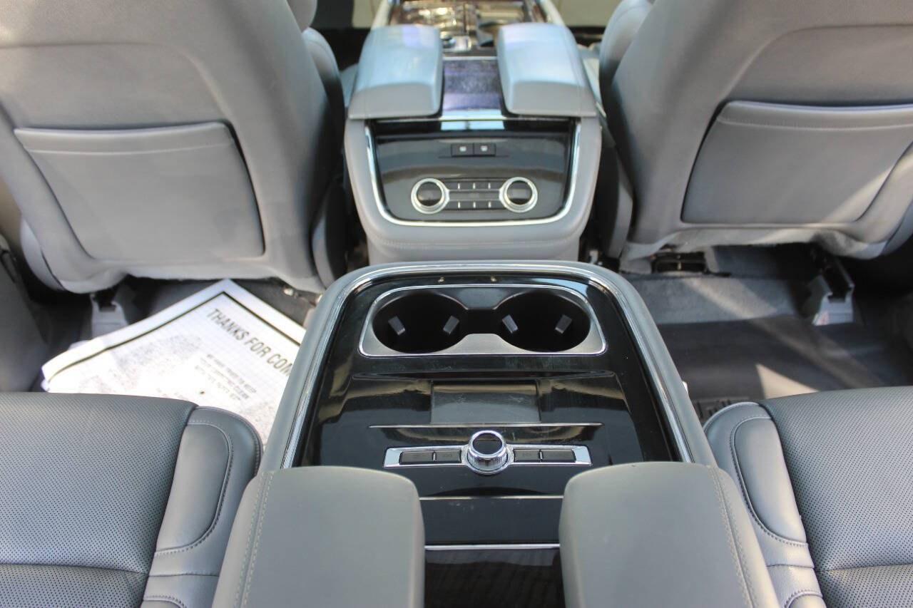 2019 Black Lincoln Navigator L L Reserve 4WD (5LMJJ3LT3KE) with an 3.5L Twin Turbo V6 450hp 510ft. lbs. 3.5L V6 engine, Automatic 10-Speed transmission, located at 4301 NW 39th , Oklahoma City, OK, 73112, (405) 949-5600, 35.512135, -97.598671 - Hablamos espanol. SPEND SMART --- BUY FROM SUPER SPORTS. ALL PRICES, DOWN PAYMENTS, PAYMENTS, AND FINANCE TERMS ARE NEGOTIABLE AT THE TIME OF APPROVAL. WE WILL WORK WITH YOU TO FIT YOUR BUDGET. WE WILL EVEN LOWER AND ADJUST THE NUMBERS TO HELP MAKE THE VEHICLE MORE AFFORDABLE FOR YOU.- Photo#38