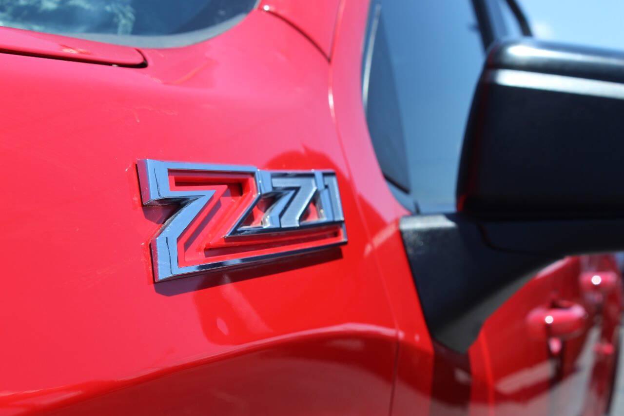2021 Red Chevrolet Silverado 1500 RST Crew Cab 4WD (3GCUYEED9MG) with an EcoTec3 5.3L V8 355hp 383ft. lbs. 5.3L V8 engine, Automatic 8-Speed transmission, located at 4301 NW 39th , Oklahoma City, OK, 73112, (405) 949-5600, 35.512135, -97.598671 - Hablamos espanol. SPEND SMART --- BUY FROM SUPER SPORTS. ALL PRICES, DOWN PAYMENTS, PAYMENTS, AND FINANCE TERMS ARE NEGOTIABLE AT THE TIME OF APPROVAL. WE WILL WORK WITH YOU TO FIT YOUR BUDGET. WE WILL EVEN LOWER AND ADJUST THE NUMBERS TO HELP MAKE THE VEHICLE MORE AFFORDABLE FOR YOU.- Photo#30
