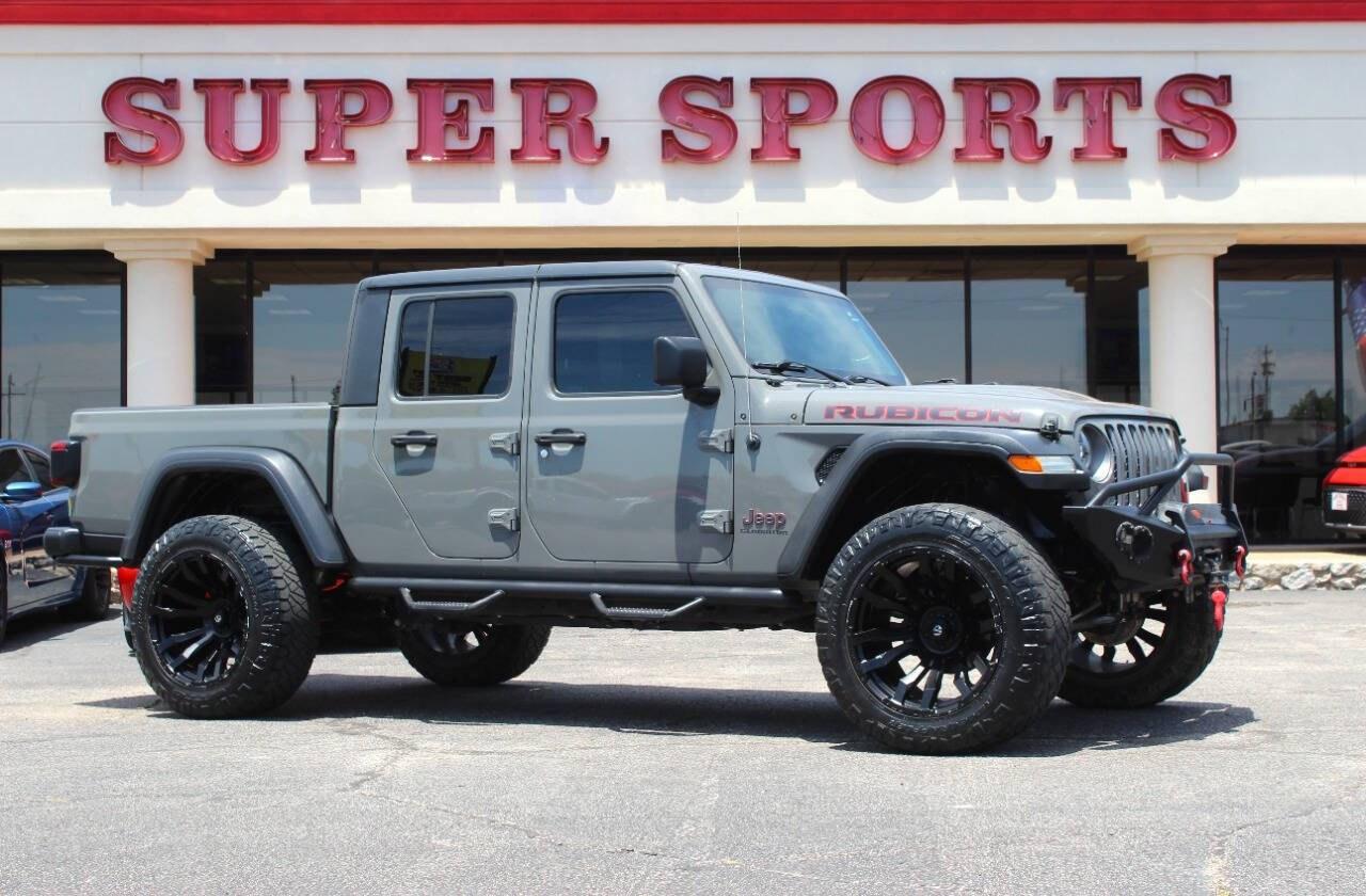 2020 Gray Jeep Gladiator Rubicon (1C6JJTBG0LL) with an 3.6L V6 3.6L V6 engine, Automatic 8-Speed transmission, located at 4301 NW 39th , Oklahoma City, OK, 73112, (405) 949-5600, 35.512135, -97.598671 - Hablamos espaol. SPEND SMART --- BUY FROM SUPER SPORTS. ASKING WHOLESALE CASH PRICE: $__,___ (CASH ONLY) PLUS $100 PROCESSING FEE. ALL PRICES, DOWN PAYMENTS, PAYMENTS, AND FINANCE TERMS ARE NEGOTIABLE AT THE TIME OF APPROVAL. WE WILL WORK WITH YOU TO FIT YOUR BUDGET. WE WILL EVEN LOW- Photo#0
