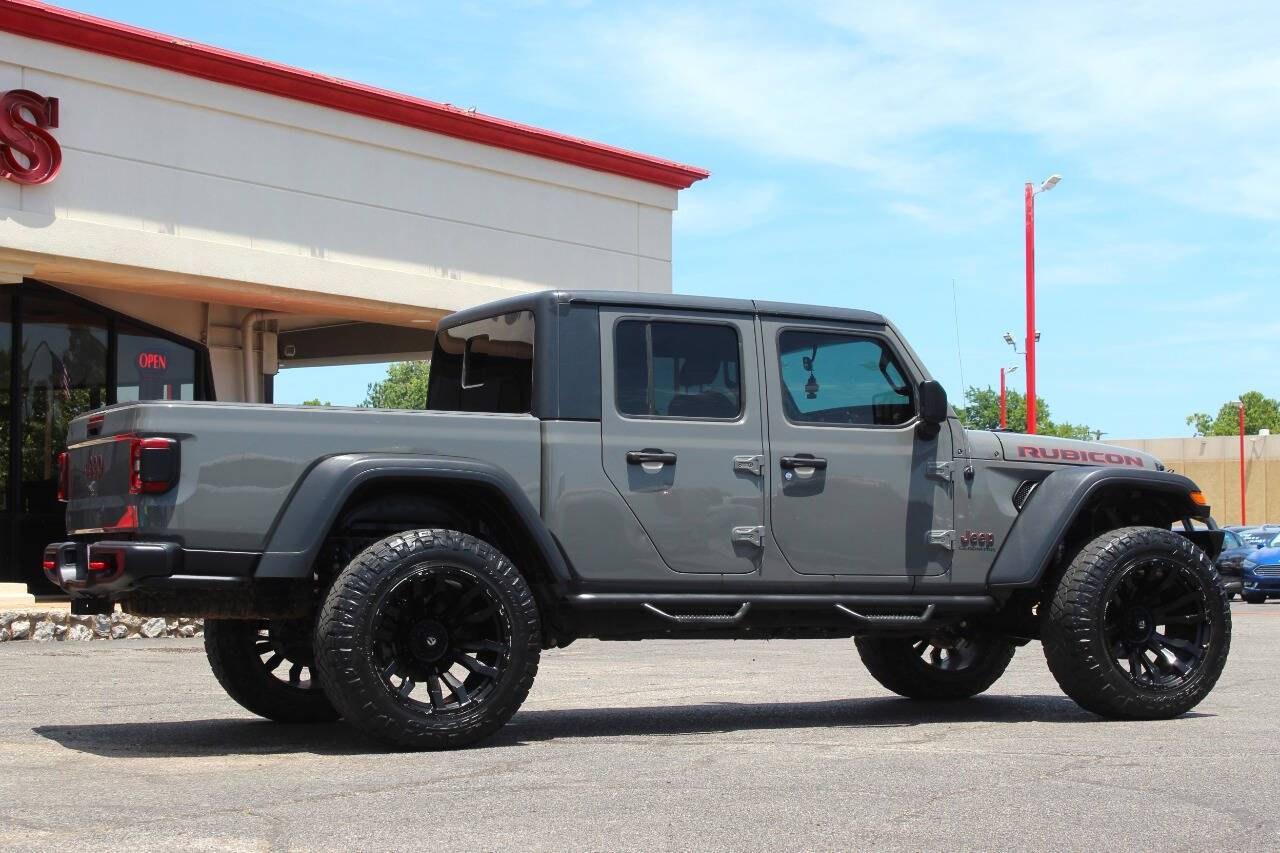 2020 Gray Jeep Gladiator Rubicon (1C6JJTBG0LL) with an 3.6L V6 3.6L V6 engine, Automatic 8-Speed transmission, located at 4301 NW 39th , Oklahoma City, OK, 73112, (405) 949-5600, 35.512135, -97.598671 - Hablamos espaol. SPEND SMART --- BUY FROM SUPER SPORTS. ASKING WHOLESALE CASH PRICE: $__,___ (CASH ONLY) PLUS $100 PROCESSING FEE. ALL PRICES, DOWN PAYMENTS, PAYMENTS, AND FINANCE TERMS ARE NEGOTIABLE AT THE TIME OF APPROVAL. WE WILL WORK WITH YOU TO FIT YOUR BUDGET. WE WILL EVEN LOW- Photo#2