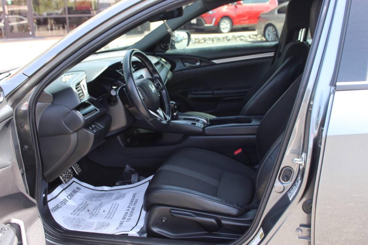 2021 Gray Honda Civic Sport Hatchback CVT (SHHFK7H40MU) with an 1.5L Turbo I4 180hp 162ft. lbs. 1.5L I4 engine, CVT 7-Speed transmission, located at 4301 NW 39th , Oklahoma City, OK, 73112, (405) 949-5600, 35.512135, -97.598671 - Hablamos espaol. SPEND SMART --- BUY FROM SUPER SPORTS. ALL PRICES, DOWN PAYMENTS, PAYMENTS, AND FINANCE TERMS ARE NEGOTIABLE AT THE TIME OF APPROVAL. WE WILL WORK WITH YOU TO FIT YOUR BUDGET. WE WILL EVEN LOWER AND ADJUST THE NUMBERS TO HELP MAKE THE VEHICLE MORE AFFORDABLE FOR YOU.- Photo#15