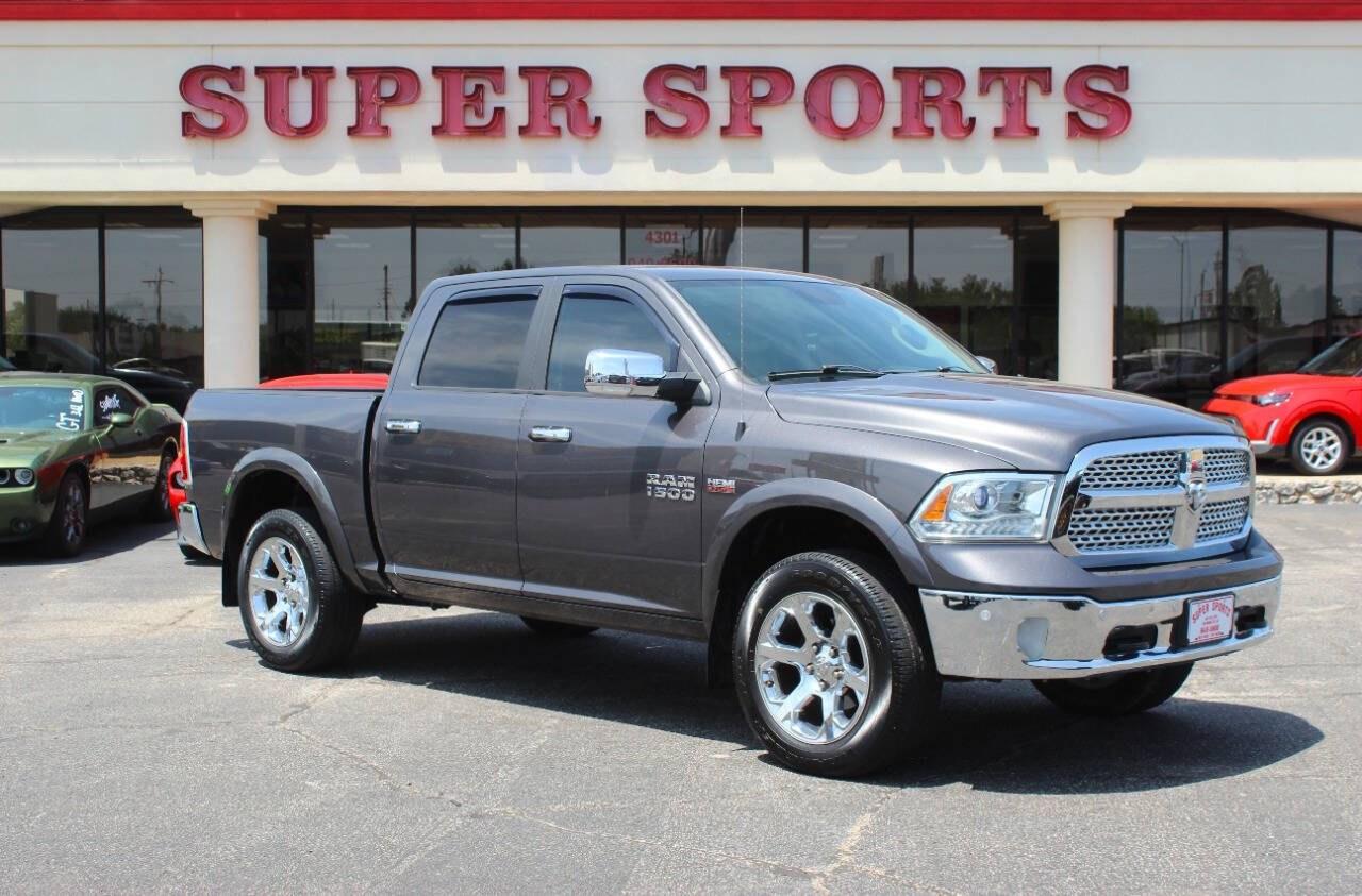 2017 Gray RAM 1500 Laramie Crew Cab SWB 4WD (1C6RR7NT4HS) with an HEMI 5.7L V8 395hp 410ft. lbs. 5.7L V8 engine, Automatic 8-Speed transmission, located at 4301 NW 39th , Oklahoma City, OK, 73112, (405) 949-5600, 35.512135, -97.598671 - Hablamos espaol. SPEND SMART --- BUY FROM SUPER SPORTS. ALL PRICES, DOWN PAYMENTS, PAYMENTS, AND FINANCE TERMS ARE NEGOTIABLE AT THE TIME OF APPROVAL. WE WILL WORK WITH YOU TO FIT YOUR BUDGET. WE WILL EVEN LOWER AND ADJUST THE NUMBERS TO HELP MAKE THE VEHICLE MORE AFFORDABLE FOR YOU.- Photo#0