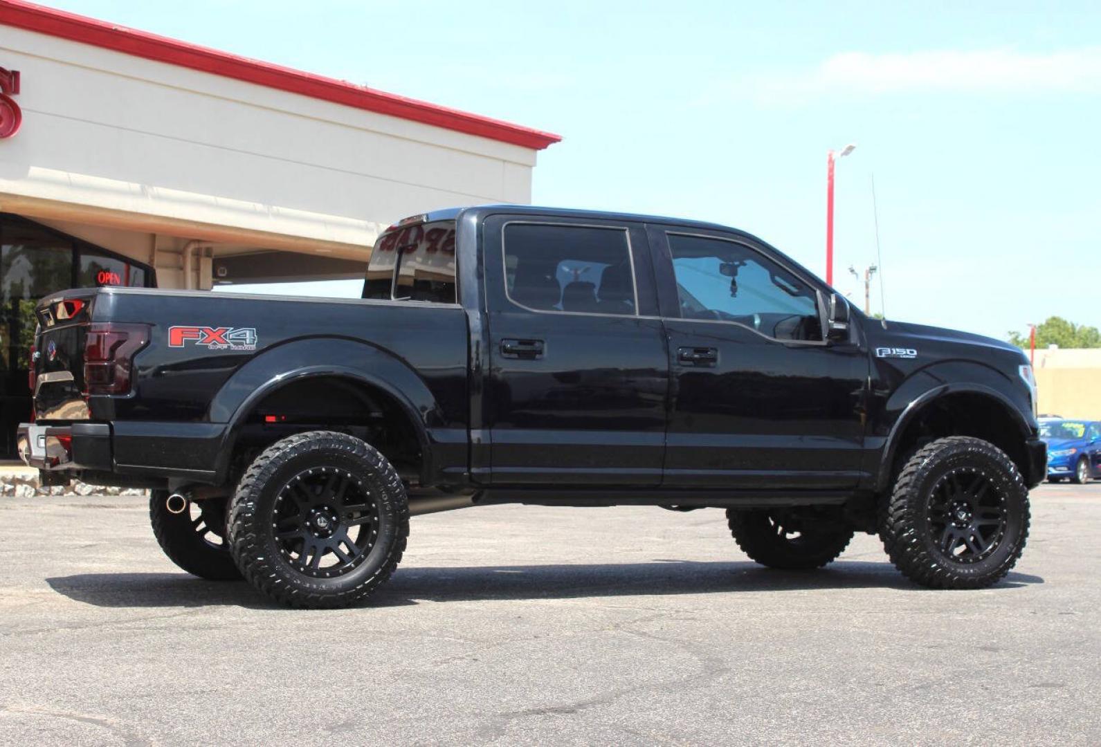 2017 Black Ford F-150 Lariat SuperCrew 6.5-ft. Bed 4WD (1FTEW1EF9HK) with an 5.0L Flex Fuel V8 385hp 387ft. lbs. 5.0L V8 engine, Automatic 6-Speed transmission, located at 4301 NW 39th , Oklahoma City, OK, 73112, (405) 949-5600, 35.512135, -97.598671 - Hablamos espanol. SPEND SMART --- BUY FROM SUPER SPORTS. ALL PRICES, DOWN PAYMENTS, PAYMENTS, AND FINANCE TERMS ARE NEGOTIABLE AT THE TIME OF APPROVAL. WE WILL WORK WITH YOU TO FIT YOUR BUDGET. WE WILL EVEN LOWER AND ADJUST THE NUMBERS TO HELP MAKE THE VEHICLE MORE AFFORDABLE FOR YOU.- Photo#2