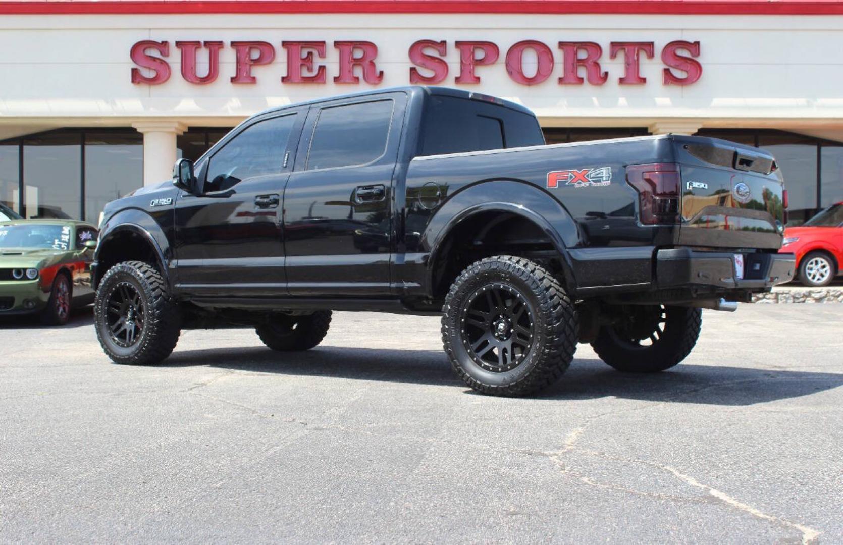 2017 Black Ford F-150 Lariat SuperCrew 6.5-ft. Bed 4WD (1FTEW1EF9HK) with an 5.0L Flex Fuel V8 385hp 387ft. lbs. 5.0L V8 engine, Automatic 6-Speed transmission, located at 4301 NW 39th , Oklahoma City, OK, 73112, (405) 949-5600, 35.512135, -97.598671 - Hablamos espanol. SPEND SMART --- BUY FROM SUPER SPORTS. ALL PRICES, DOWN PAYMENTS, PAYMENTS, AND FINANCE TERMS ARE NEGOTIABLE AT THE TIME OF APPROVAL. WE WILL WORK WITH YOU TO FIT YOUR BUDGET. WE WILL EVEN LOWER AND ADJUST THE NUMBERS TO HELP MAKE THE VEHICLE MORE AFFORDABLE FOR YOU.- Photo#4