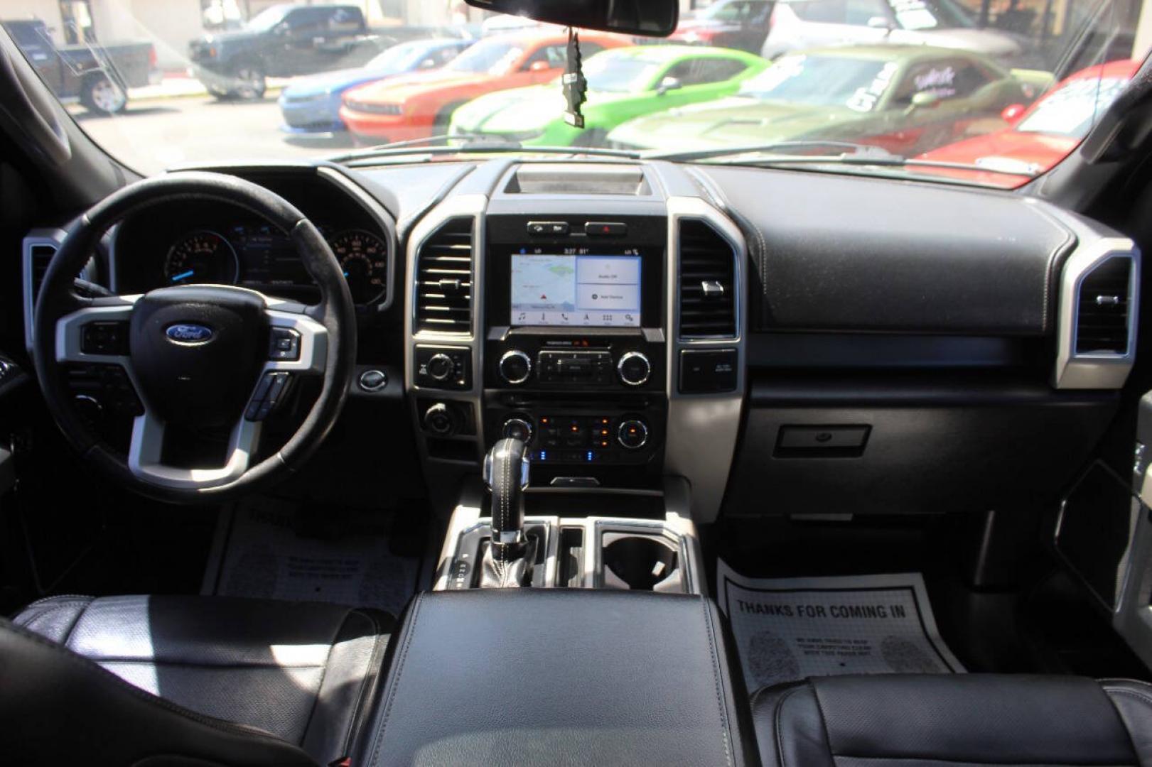 2017 Black Ford F-150 Lariat SuperCrew 6.5-ft. Bed 4WD (1FTEW1EF9HK) with an 5.0L Flex Fuel V8 385hp 387ft. lbs. 5.0L V8 engine, Automatic 6-Speed transmission, located at 4301 NW 39th , Oklahoma City, OK, 73112, (405) 949-5600, 35.512135, -97.598671 - Hablamos espanol. SPEND SMART --- BUY FROM SUPER SPORTS. ALL PRICES, DOWN PAYMENTS, PAYMENTS, AND FINANCE TERMS ARE NEGOTIABLE AT THE TIME OF APPROVAL. WE WILL WORK WITH YOU TO FIT YOUR BUDGET. WE WILL EVEN LOWER AND ADJUST THE NUMBERS TO HELP MAKE THE VEHICLE MORE AFFORDABLE FOR YOU.- Photo#21