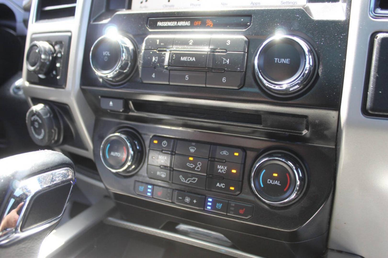 2017 Black Ford F-150 Lariat SuperCrew 6.5-ft. Bed 4WD (1FTEW1EF9HK) with an 5.0L Flex Fuel V8 385hp 387ft. lbs. 5.0L V8 engine, Automatic 6-Speed transmission, located at 4301 NW 39th , Oklahoma City, OK, 73112, (405) 949-5600, 35.512135, -97.598671 - Hablamos espanol. SPEND SMART --- BUY FROM SUPER SPORTS. ALL PRICES, DOWN PAYMENTS, PAYMENTS, AND FINANCE TERMS ARE NEGOTIABLE AT THE TIME OF APPROVAL. WE WILL WORK WITH YOU TO FIT YOUR BUDGET. WE WILL EVEN LOWER AND ADJUST THE NUMBERS TO HELP MAKE THE VEHICLE MORE AFFORDABLE FOR YOU.- Photo#23