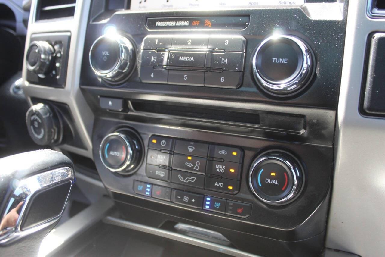 2017 Black Ford F-150 Lariat SuperCrew 6.5-ft. Bed 4WD (1FTEW1EF9HK) with an 5.0L Flex Fuel V8 385hp 387ft. lbs. 5.0L V8 engine, Automatic 6-Speed transmission, located at 4301 NW 39th , Oklahoma City, OK, 73112, (405) 949-5600, 35.512135, -97.598671 - Hablamos espaol. SPEND SMART --- BUY FROM SUPER SPORTS. ALL PRICES, DOWN PAYMENTS, PAYMENTS, AND FINANCE TERMS ARE NEGOTIABLE AT THE TIME OF APPROVAL. WE WILL WORK WITH YOU TO FIT YOUR BUDGET. WE WILL EVEN LOWER AND ADJUST THE NUMBERS TO HELP MAKE THE VEHICLE MORE AFFORDABLE FOR YOU.- Photo#23