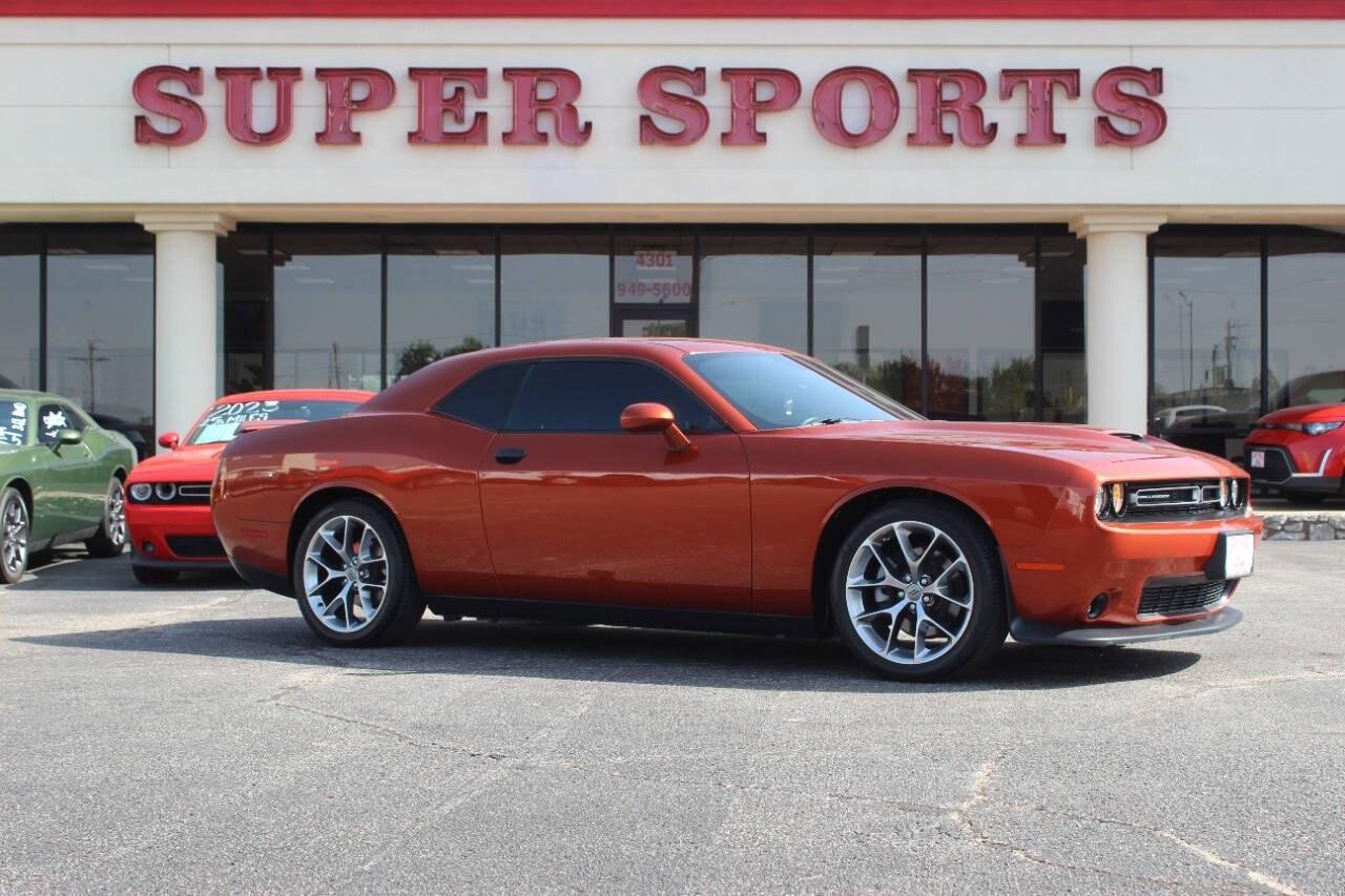 2020 Orange Dodge Challenger GT (2C3CDZJG9LH) with an Pentastar 3.6L V6 303hp 268ft. lbs. 3.6L V6 engine, Automatic 8-Speed transmission, located at 4301 NW 39th , Oklahoma City, OK, 73112, (405) 949-5600, 35.512135, -97.598671 - Hablamos espaol. SPEND SMART --- BUY FROM SUPER SPORTS. ALL PRICES, DOWN PAYMENTS, PAYMENTS, AND FINANCE TERMS ARE NEGOTIABLE AT THE TIME OF APPROVAL. WE WILL WORK WITH YOU TO FIT YOUR BUDGET. WE WILL EVEN LOWER AND ADJUST THE NUMBERS TO HELP MAKE THE VEHICLE MORE AFFORDABLE FOR YOU.- Photo#0