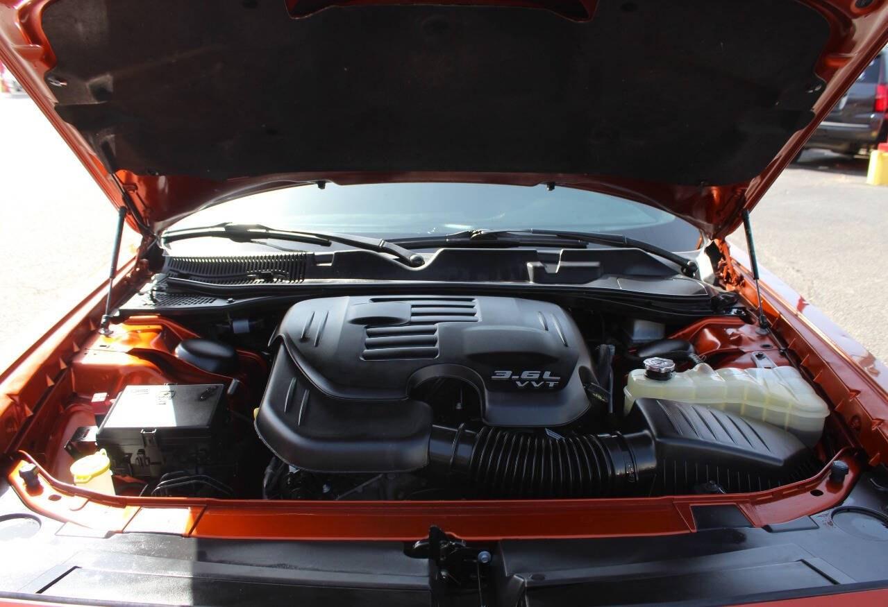 2020 Orange Dodge Challenger GT (2C3CDZJG9LH) with an Pentastar 3.6L V6 303hp 268ft. lbs. 3.6L V6 engine, Automatic 8-Speed transmission, located at 4301 NW 39th , Oklahoma City, OK, 73112, (405) 949-5600, 35.512135, -97.598671 - Hablamos espaol. SPEND SMART --- BUY FROM SUPER SPORTS. ALL PRICES, DOWN PAYMENTS, PAYMENTS, AND FINANCE TERMS ARE NEGOTIABLE AT THE TIME OF APPROVAL. WE WILL WORK WITH YOU TO FIT YOUR BUDGET. WE WILL EVEN LOWER AND ADJUST THE NUMBERS TO HELP MAKE THE VEHICLE MORE AFFORDABLE FOR YOU.- Photo#7