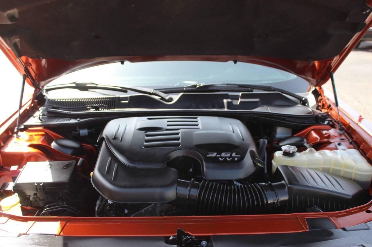 2020 Orange Dodge Challenger GT (2C3CDZJG9LH) with an Pentastar 3.6L V6 303hp 268ft. lbs. 3.6L V6 engine, Automatic 8-Speed transmission, located at 4301 NW 39th , Oklahoma City, OK, 73112, (405) 949-5600, 35.512135, -97.598671 - Hablamos espaol. SPEND SMART --- BUY FROM SUPER SPORTS. ALL PRICES, DOWN PAYMENTS, PAYMENTS, AND FINANCE TERMS ARE NEGOTIABLE AT THE TIME OF APPROVAL. WE WILL WORK WITH YOU TO FIT YOUR BUDGET. WE WILL EVEN LOWER AND ADJUST THE NUMBERS TO HELP MAKE THE VEHICLE MORE AFFORDABLE FOR YOU.- Photo#8
