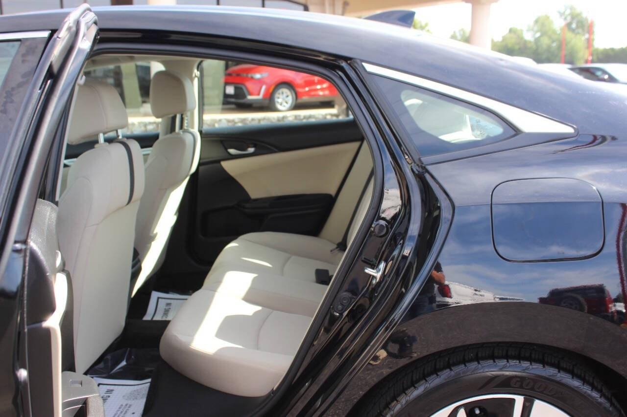 2017 Black Honda Civic EX-T Sedan CVT (19XFC1F32HE) with an 1.5L Turbo I4 174hp 162ft. lbs. 1.5L I4 engine, CVT transmission, located at 4301 NW 39th , Oklahoma City, OK, 73112, (405) 949-5600, 35.512135, -97.598671 - Hablamos espaol. SPEND SMART --- BUY FROM SUPER SPORTS. ALL PRICES, DOWN PAYMENTS, PAYMENTS, AND FINANCE TERMS ARE NEGOTIABLE AT THE TIME OF APPROVAL. WE WILL WORK WITH YOU TO FIT YOUR BUDGET. WE WILL EVEN LOWER AND ADJUST THE NUMBERS TO HELP MAKE THE VEHICLE MORE AFFORDABLE FOR YOU.- Photo#13