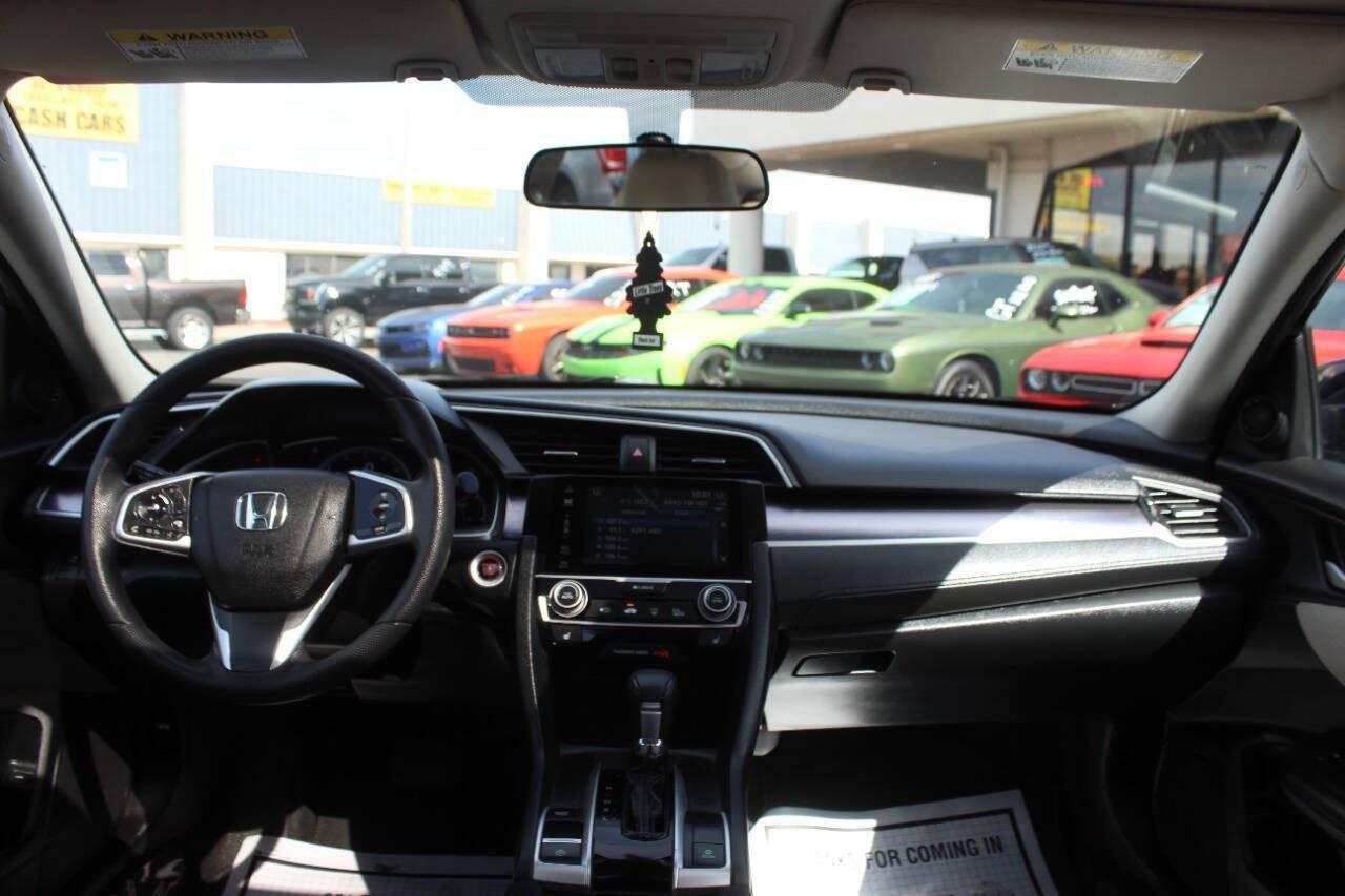 2017 Black Honda Civic EX-T Sedan CVT (19XFC1F32HE) with an 1.5L Turbo I4 174hp 162ft. lbs. 1.5L I4 engine, CVT transmission, located at 4301 NW 39th , Oklahoma City, OK, 73112, (405) 949-5600, 35.512135, -97.598671 - Hablamos espaol. SPEND SMART --- BUY FROM SUPER SPORTS. ALL PRICES, DOWN PAYMENTS, PAYMENTS, AND FINANCE TERMS ARE NEGOTIABLE AT THE TIME OF APPROVAL. WE WILL WORK WITH YOU TO FIT YOUR BUDGET. WE WILL EVEN LOWER AND ADJUST THE NUMBERS TO HELP MAKE THE VEHICLE MORE AFFORDABLE FOR YOU.- Photo#17