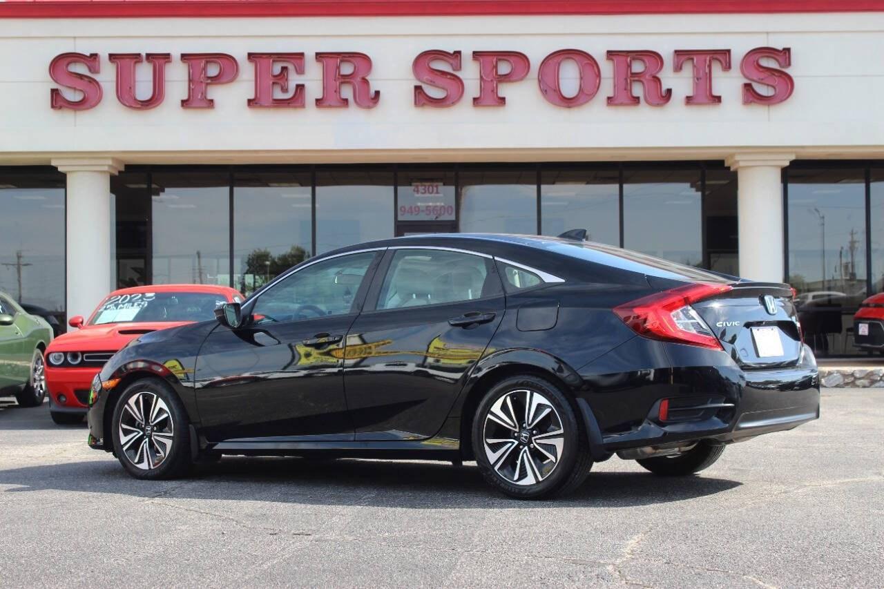 2017 Black Honda Civic EX-T Sedan CVT (19XFC1F32HE) with an 1.5L Turbo I4 174hp 162ft. lbs. 1.5L I4 engine, CVT transmission, located at 4301 NW 39th , Oklahoma City, OK, 73112, (405) 949-5600, 35.512135, -97.598671 - Hablamos espaol. SPEND SMART --- BUY FROM SUPER SPORTS. ALL PRICES, DOWN PAYMENTS, PAYMENTS, AND FINANCE TERMS ARE NEGOTIABLE AT THE TIME OF APPROVAL. WE WILL WORK WITH YOU TO FIT YOUR BUDGET. WE WILL EVEN LOWER AND ADJUST THE NUMBERS TO HELP MAKE THE VEHICLE MORE AFFORDABLE FOR YOU.- Photo#4