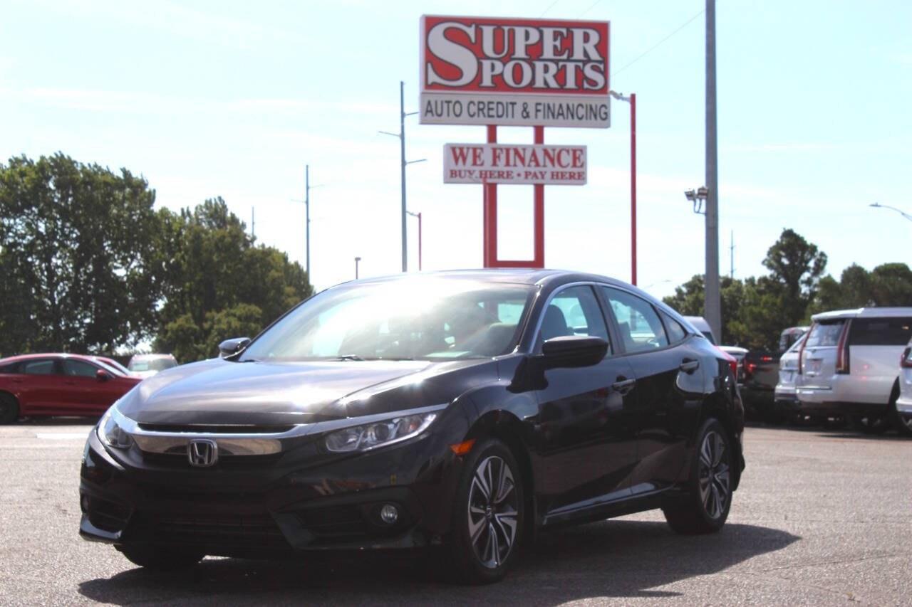 2017 Black Honda Civic EX-T Sedan CVT (19XFC1F32HE) with an 1.5L Turbo I4 174hp 162ft. lbs. 1.5L I4 engine, CVT transmission, located at 4301 NW 39th , Oklahoma City, OK, 73112, (405) 949-5600, 35.512135, -97.598671 - Hablamos espaol. SPEND SMART --- BUY FROM SUPER SPORTS. ALL PRICES, DOWN PAYMENTS, PAYMENTS, AND FINANCE TERMS ARE NEGOTIABLE AT THE TIME OF APPROVAL. WE WILL WORK WITH YOU TO FIT YOUR BUDGET. WE WILL EVEN LOWER AND ADJUST THE NUMBERS TO HELP MAKE THE VEHICLE MORE AFFORDABLE FOR YOU.- Photo#6