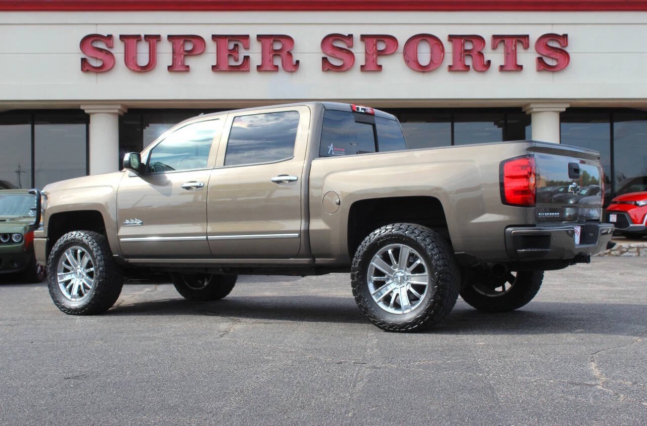 2014 Brown Chevrolet Silverado 1500 High Country Crew Cab 4WD (3GCUKTEC3EG) with an EcoTec3 5.3L Flex Fuel V8 355hp 383ft. lbs. 5.3L V8 engine, Automatic 6-Speed transmission, located at 4301 NW 39th , Oklahoma City, OK, 73112, (405) 949-5600, 35.512135, -97.598671 - Hablamos espaol. SPEND SMART --- BUY FROM SUPER SPORTS. ALL PRICES, DOWN PAYMENTS, PAYMENTS, AND FINANCE TERMS ARE NEGOTIABLE AT THE TIME OF APPROVAL. WE WILL WORK WITH YOU TO FIT YOUR BUDGET. WE WILL EVEN LOWER AND ADJUST THE NUMBERS TO HELP MAKE THE VEHICLE MORE AFFORDABLE FOR YOU.- Photo#4
