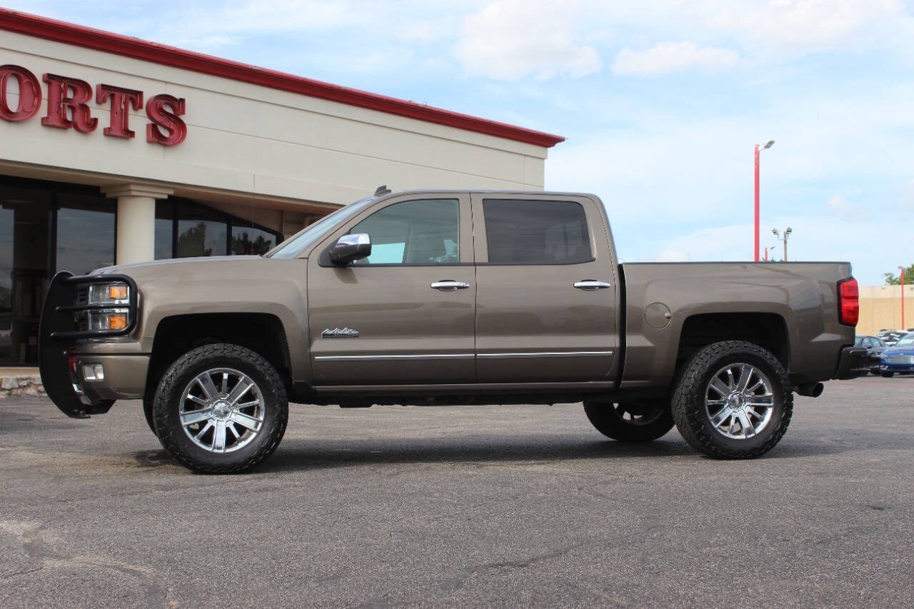 2014 Brown Chevrolet Silverado 1500 High Country Crew Cab 4WD (3GCUKTEC3EG) with an EcoTec3 5.3L Flex Fuel V8 355hp 383ft. lbs. 5.3L V8 engine, Automatic 6-Speed transmission, located at 4301 NW 39th , Oklahoma City, OK, 73112, (405) 949-5600, 35.512135, -97.598671 - Hablamos espaol. SPEND SMART --- BUY FROM SUPER SPORTS. ALL PRICES, DOWN PAYMENTS, PAYMENTS, AND FINANCE TERMS ARE NEGOTIABLE AT THE TIME OF APPROVAL. WE WILL WORK WITH YOU TO FIT YOUR BUDGET. WE WILL EVEN LOWER AND ADJUST THE NUMBERS TO HELP MAKE THE VEHICLE MORE AFFORDABLE FOR YOU.- Photo#5