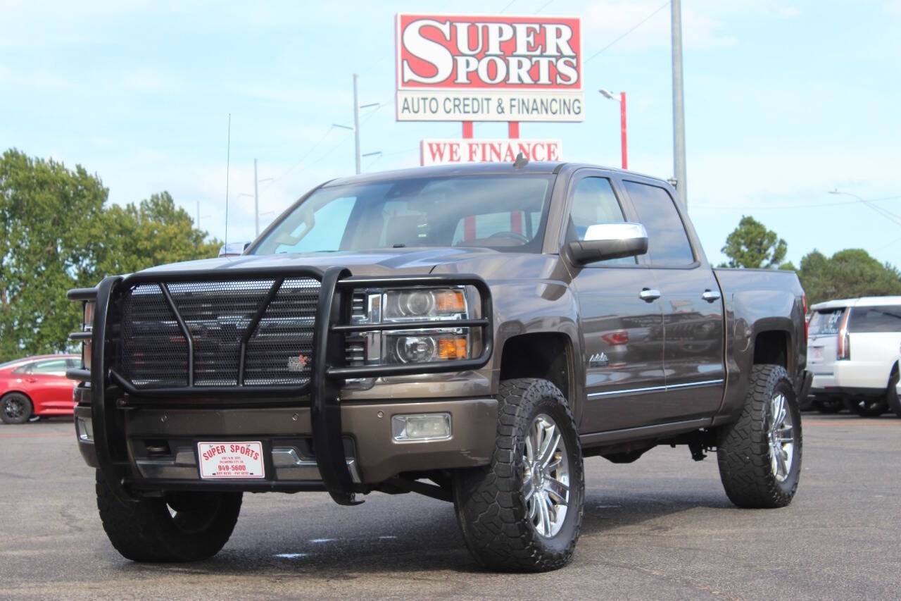 2014 Brown Chevrolet Silverado 1500 High Country Crew Cab 4WD (3GCUKTEC3EG) with an EcoTec3 5.3L Flex Fuel V8 355hp 383ft. lbs. 5.3L V8 engine, Automatic 6-Speed transmission, located at 4301 NW 39th , Oklahoma City, OK, 73112, (405) 949-5600, 35.512135, -97.598671 - Hablamos espaol. SPEND SMART --- BUY FROM SUPER SPORTS. ALL PRICES, DOWN PAYMENTS, PAYMENTS, AND FINANCE TERMS ARE NEGOTIABLE AT THE TIME OF APPROVAL. WE WILL WORK WITH YOU TO FIT YOUR BUDGET. WE WILL EVEN LOWER AND ADJUST THE NUMBERS TO HELP MAKE THE VEHICLE MORE AFFORDABLE FOR YOU.- Photo#6