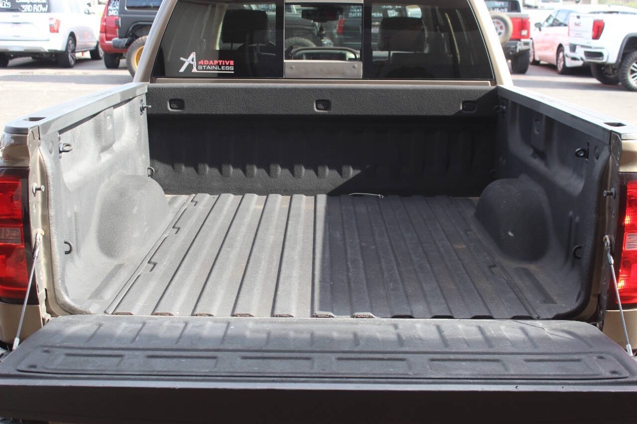 2014 Brown Chevrolet Silverado 1500 High Country Crew Cab 4WD (3GCUKTEC3EG) with an EcoTec3 5.3L Flex Fuel V8 355hp 383ft. lbs. 5.3L V8 engine, Automatic 6-Speed transmission, located at 4301 NW 39th , Oklahoma City, OK, 73112, (405) 949-5600, 35.512135, -97.598671 - Hablamos espaol. SPEND SMART --- BUY FROM SUPER SPORTS. ALL PRICES, DOWN PAYMENTS, PAYMENTS, AND FINANCE TERMS ARE NEGOTIABLE AT THE TIME OF APPROVAL. WE WILL WORK WITH YOU TO FIT YOUR BUDGET. WE WILL EVEN LOWER AND ADJUST THE NUMBERS TO HELP MAKE THE VEHICLE MORE AFFORDABLE FOR YOU.- Photo#13