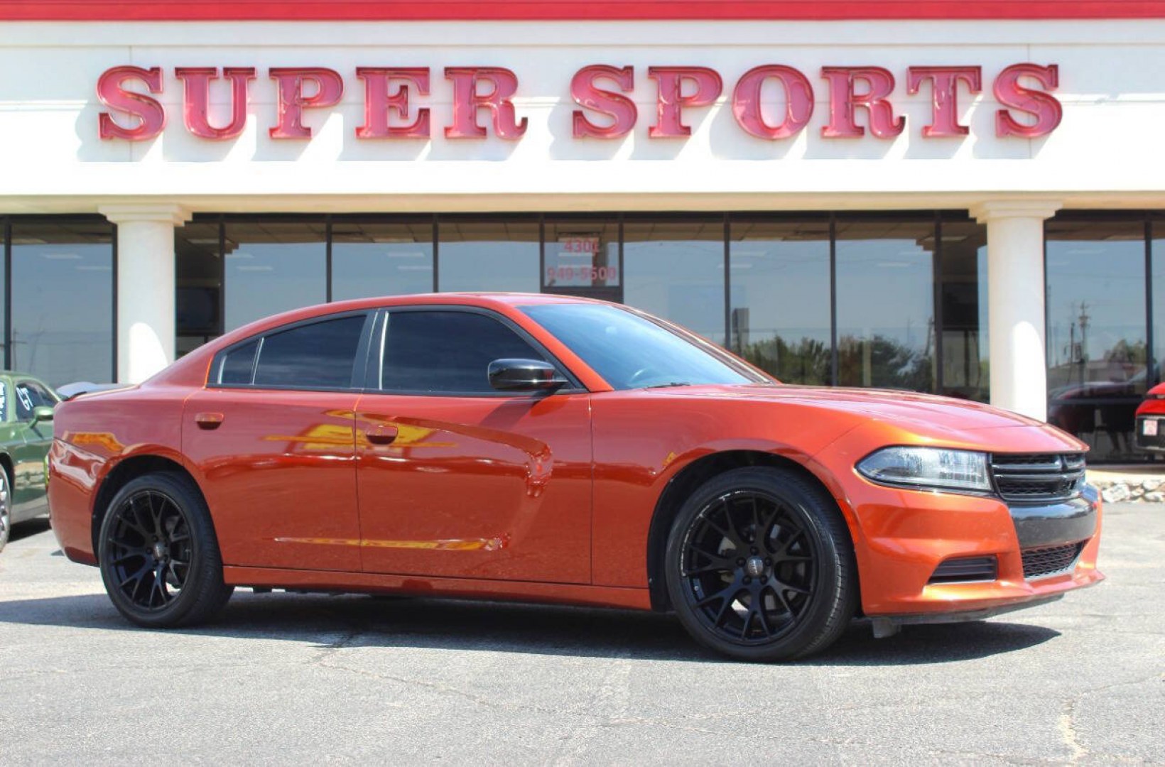 2021 Orange Dodge Charger SXT (2C3CDXBG6MH) with an Pentastar 3.6L V6 292hp 260ft. lbs. 3.6L V6 engine, Automatic 8-Speed transmission, located at 4301 NW 39th , Oklahoma City, OK, 73112, (405) 949-5600, 35.512135, -97.598671 - Hablamos espanol. SPEND SMART --- BUY FROM SUPER SPORTS. ALL PRICES, DOWN PAYMENTS, PAYMENTS, AND FINANCE TERMS ARE NEGOTIABLE AT THE TIME OF APPROVAL. WE WILL WORK WITH YOU TO FIT YOUR BUDGET. WE WILL EVEN LOWER AND ADJUST THE NUMBERS TO HELP MAKE THE VEHICLE MORE AFFORDABLE FOR YOU.- Photo#0